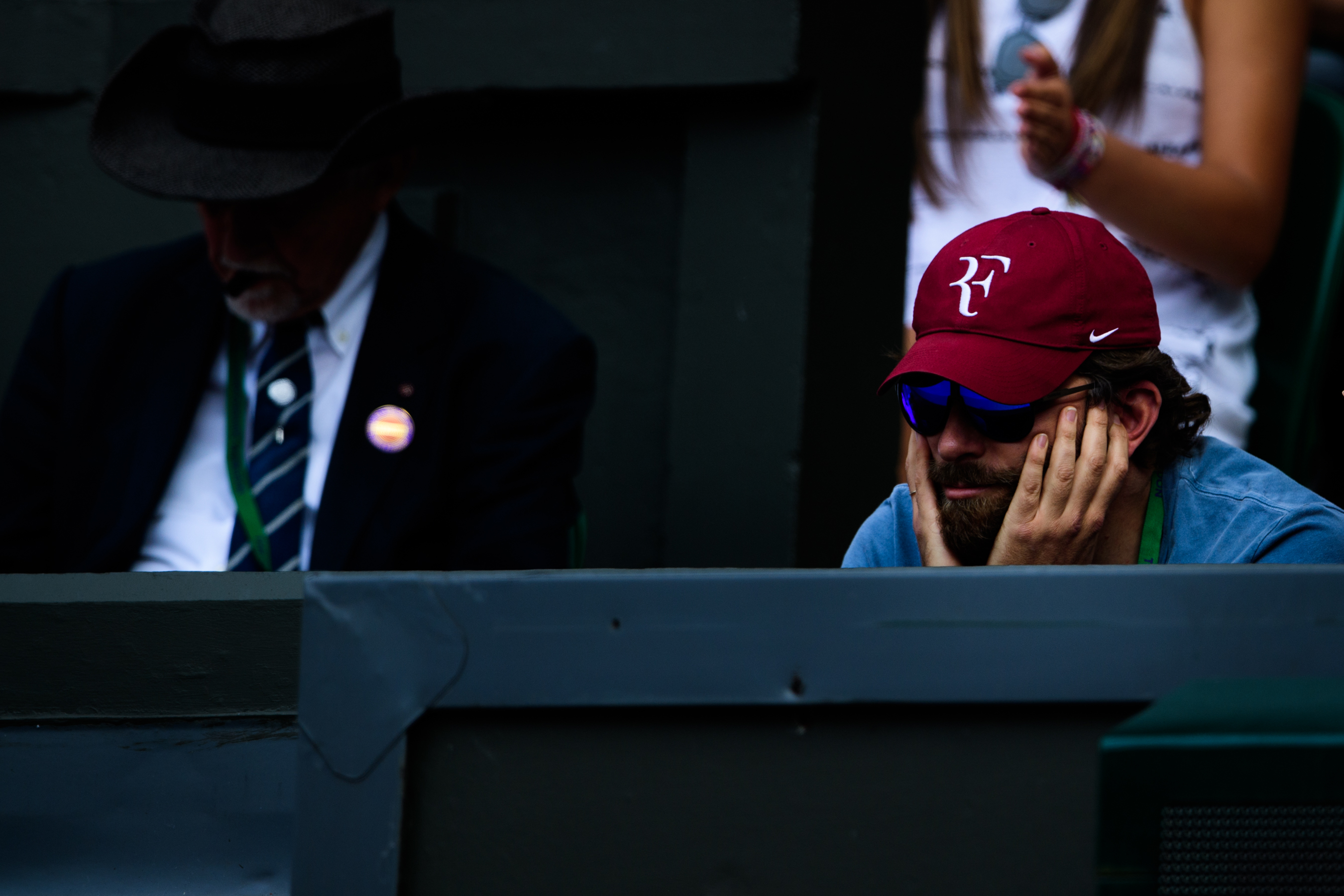Famous American actor watching tennis