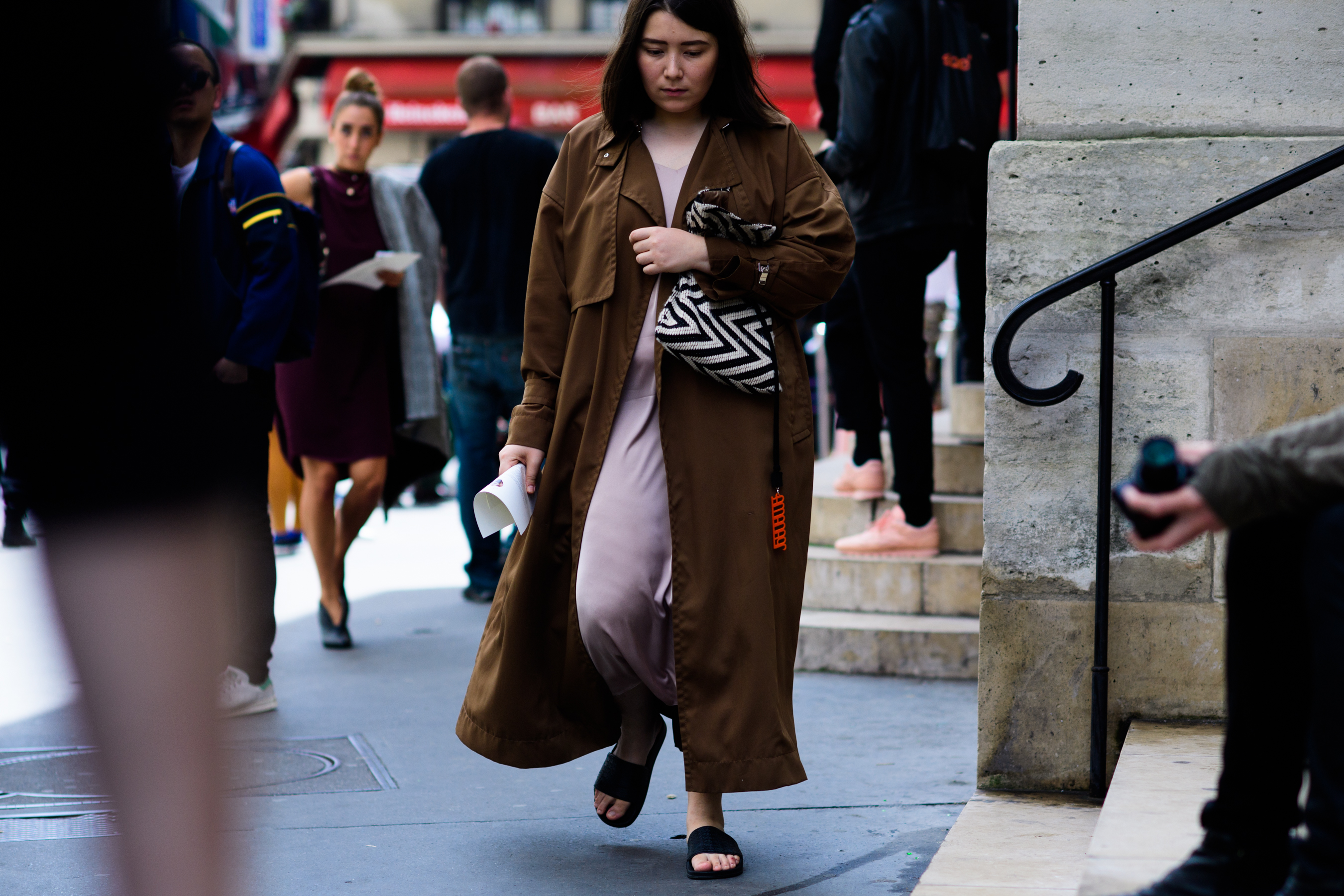Woman wearing dark brown coat