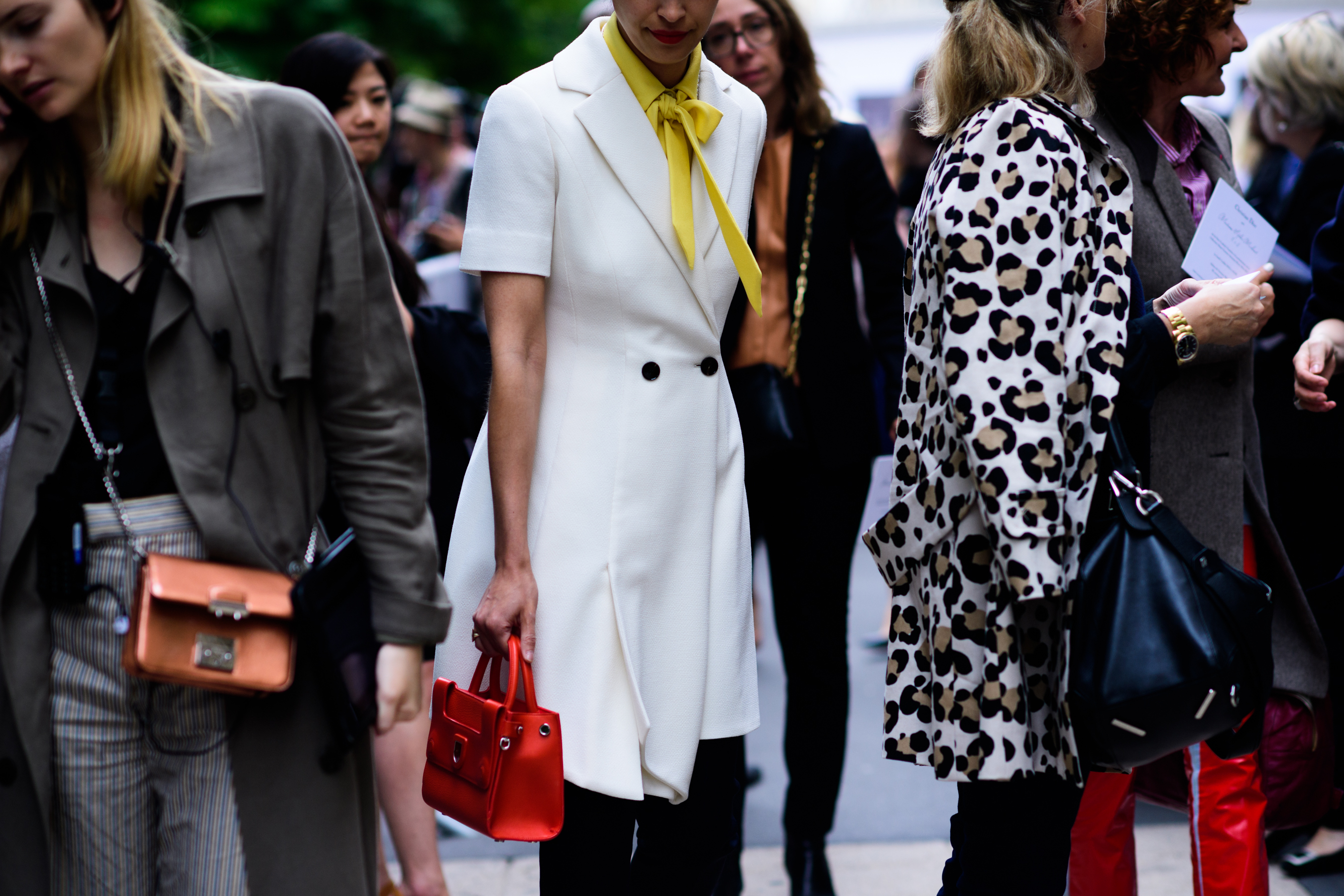 British editor wearing white coat
