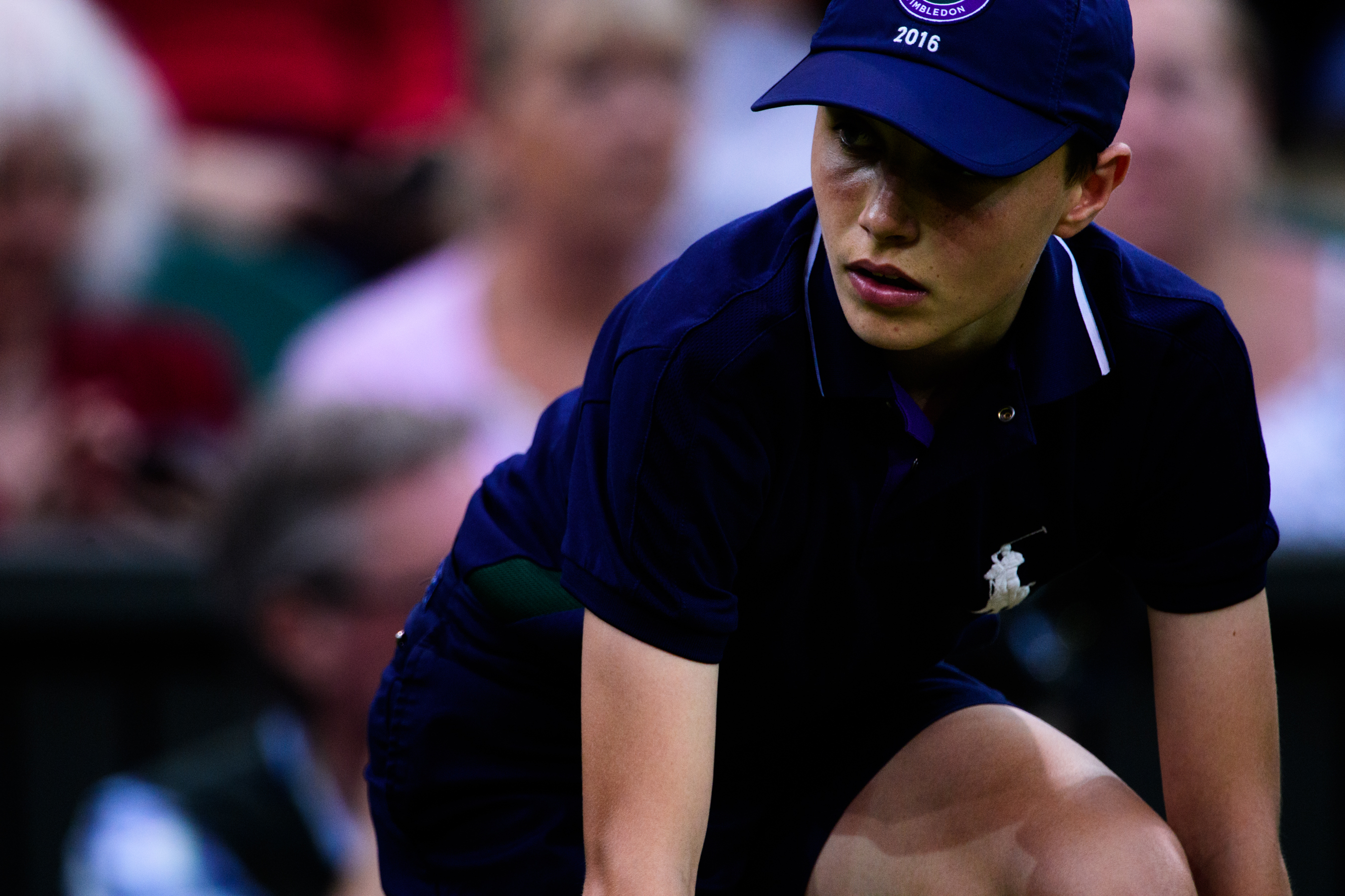 Boy wearing blue Ralph Lauren uniform