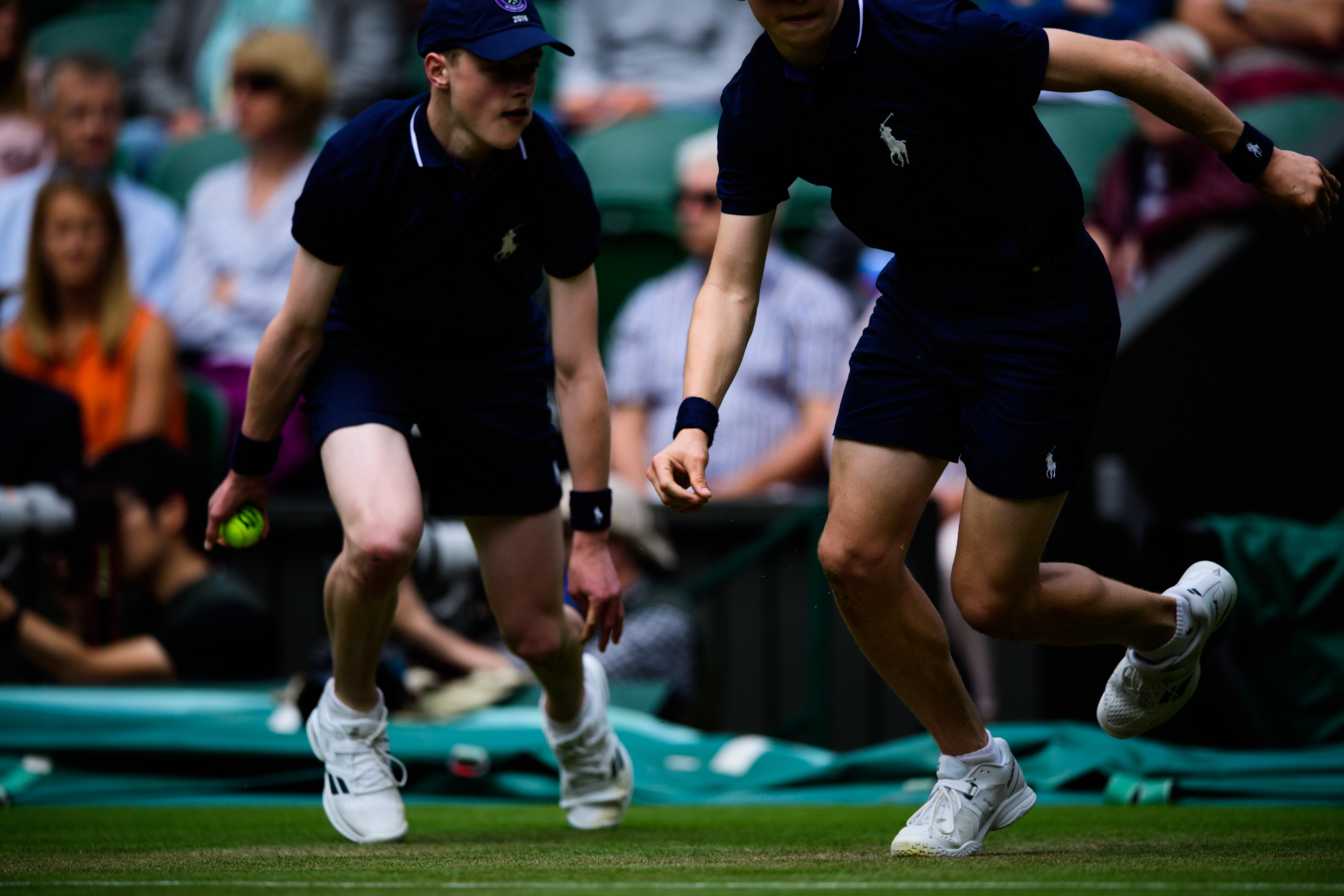 Boys wearing blue tourament staff uniform