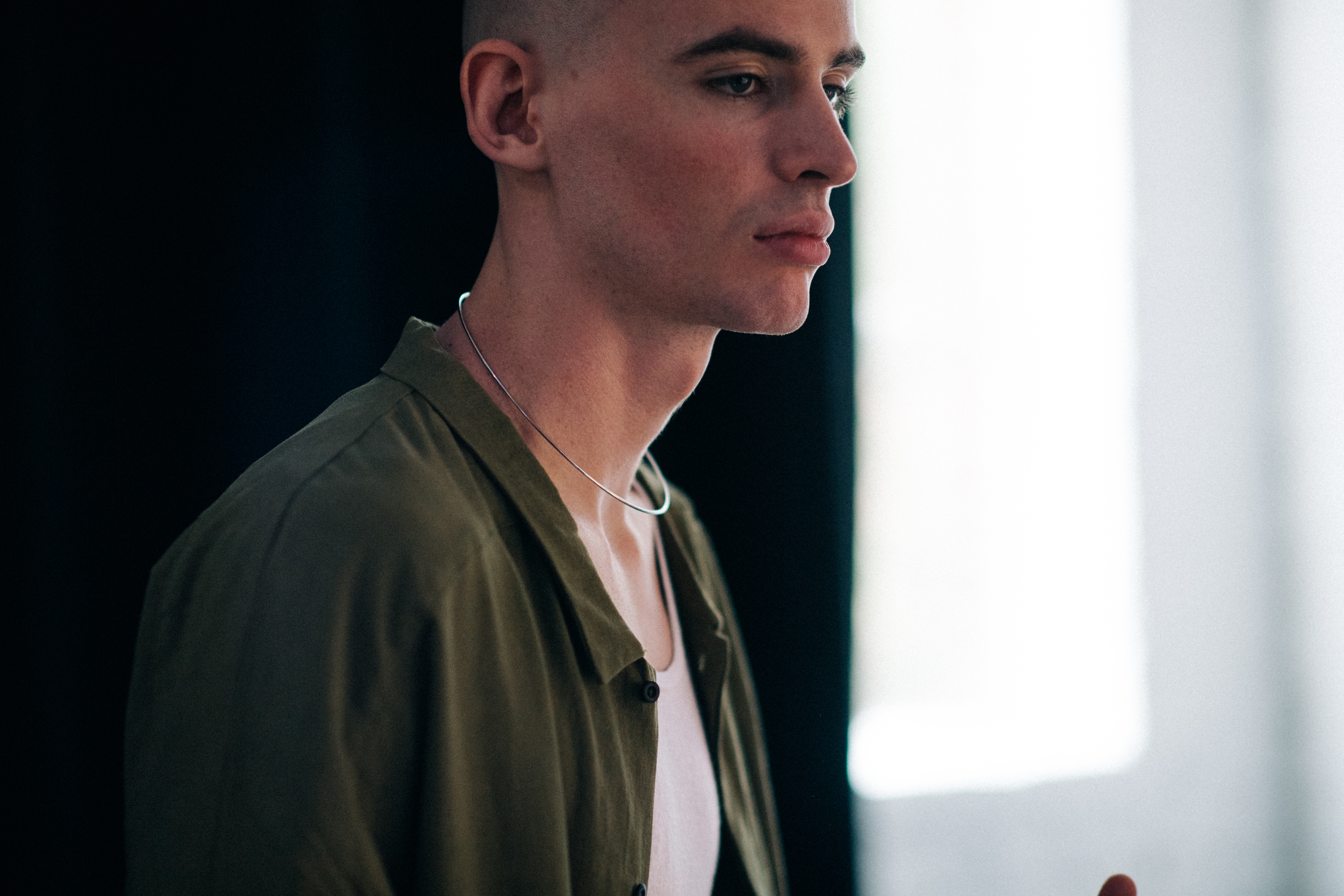 Male model wearing green shirt