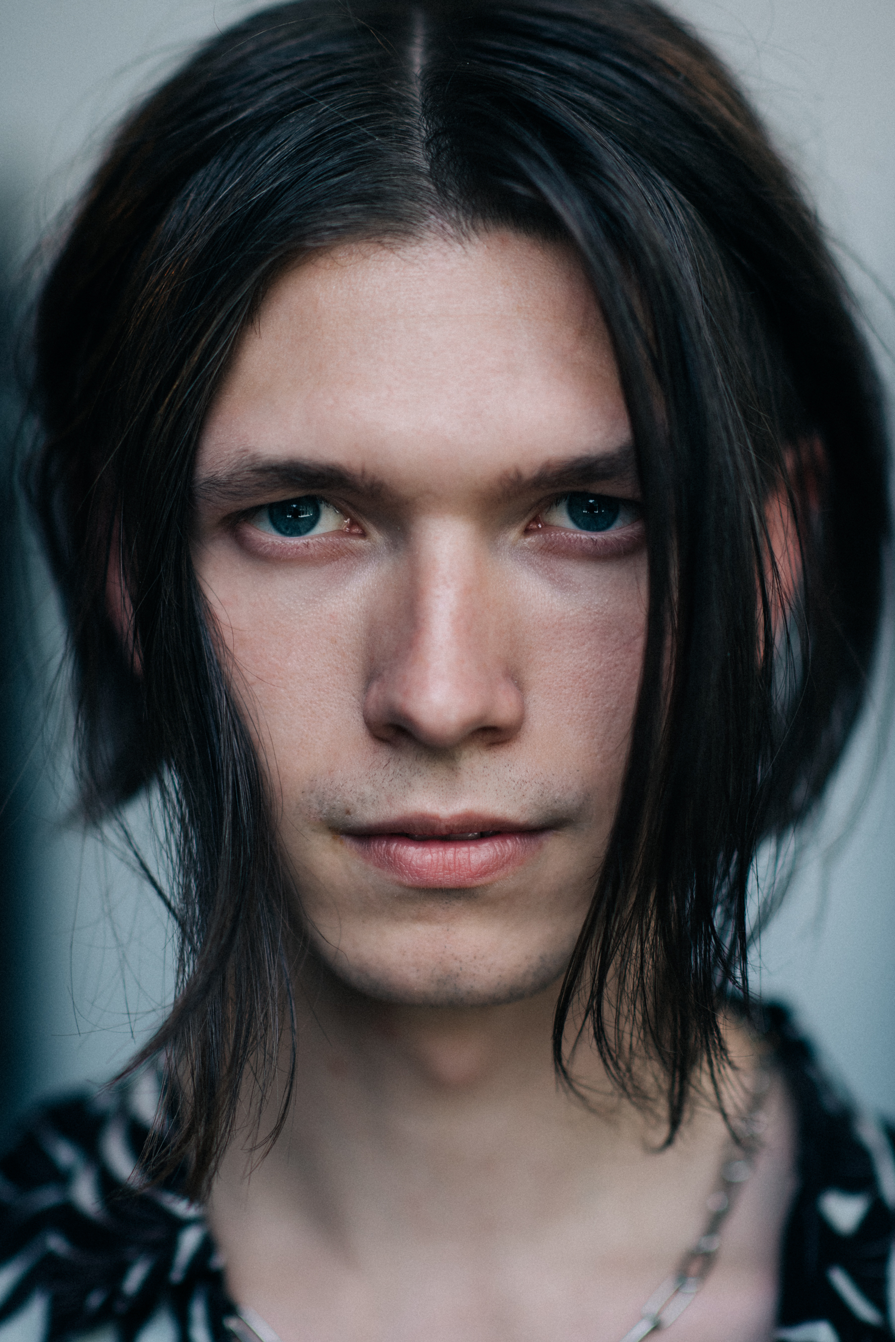 Portrait of a male model with long hair