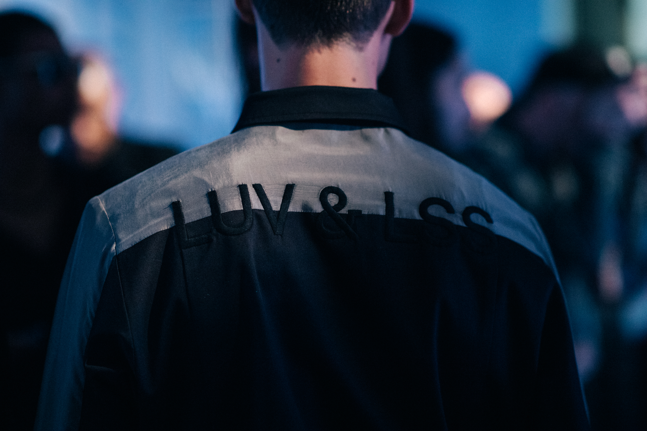 Male model wearing shirt with letters