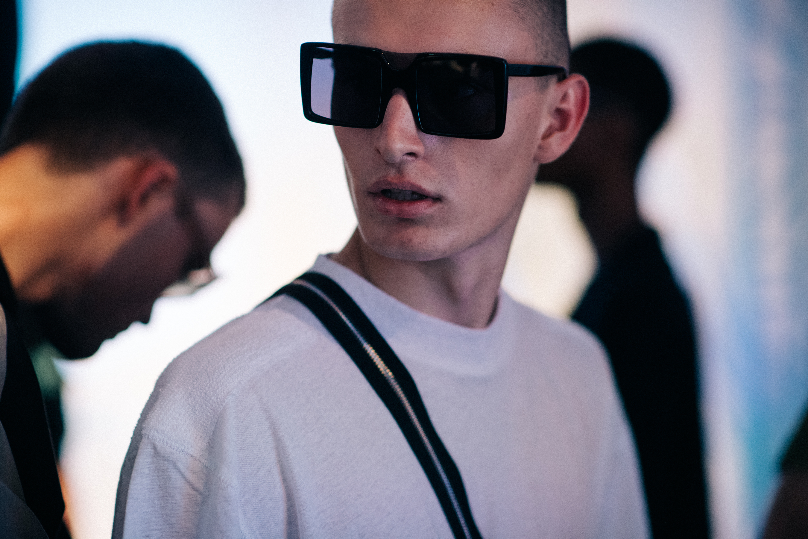 Male model wearing dark glasses