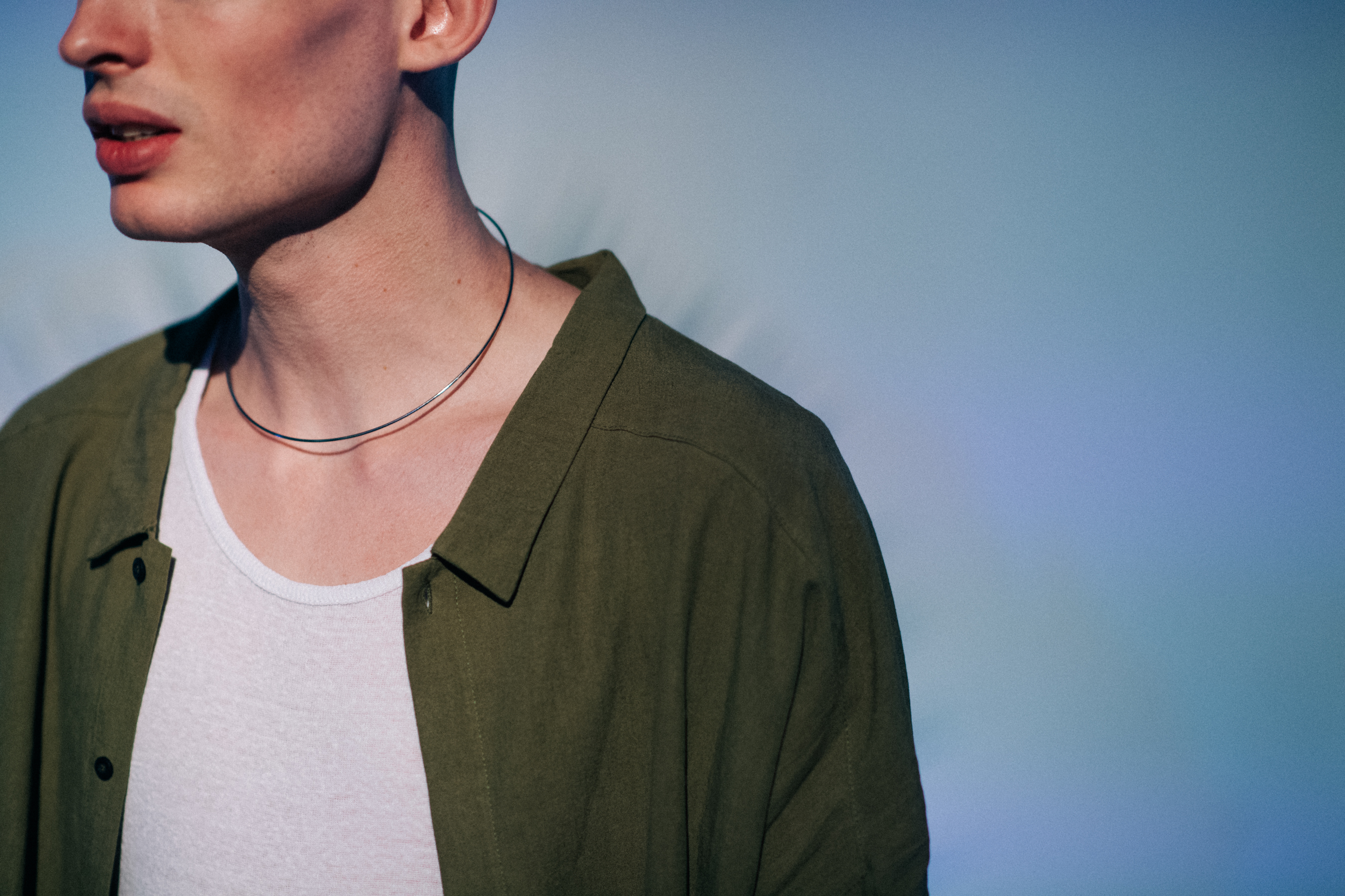Male model wearing green shirt