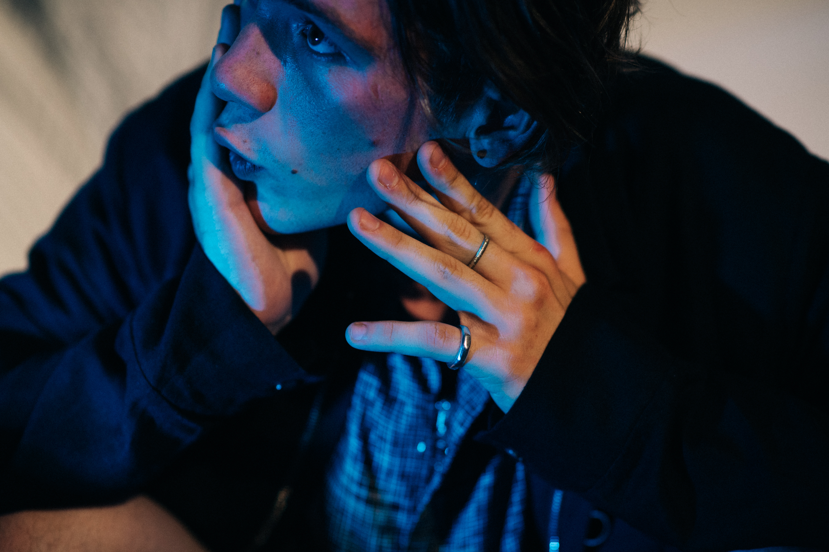 Male model wearing two rings