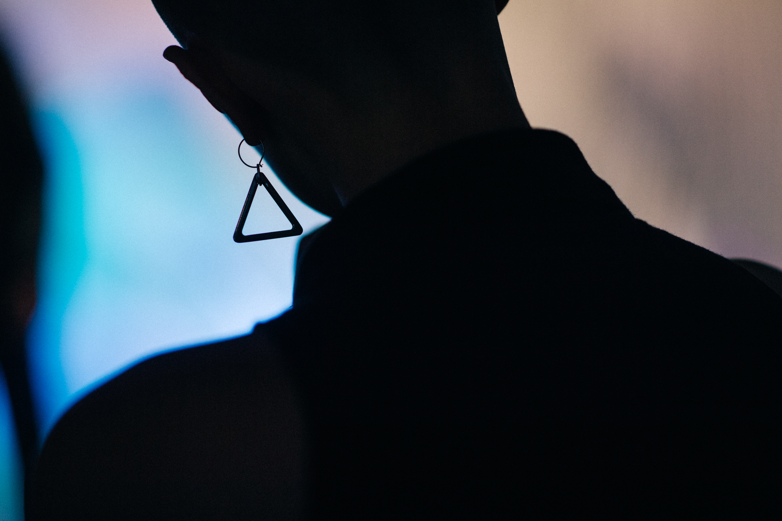 Silhouette of triangle shaped earring