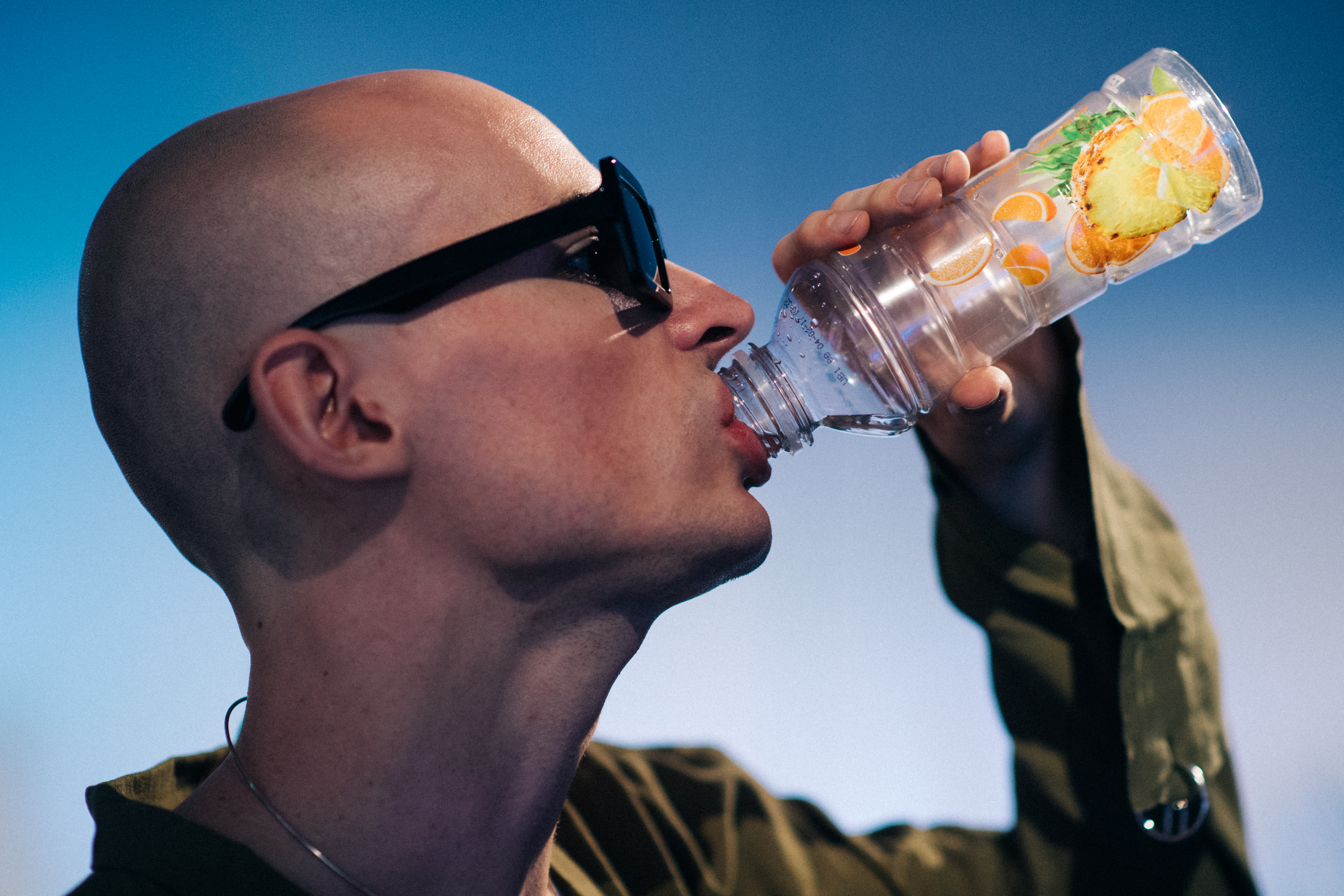Male model drinking vitamin water