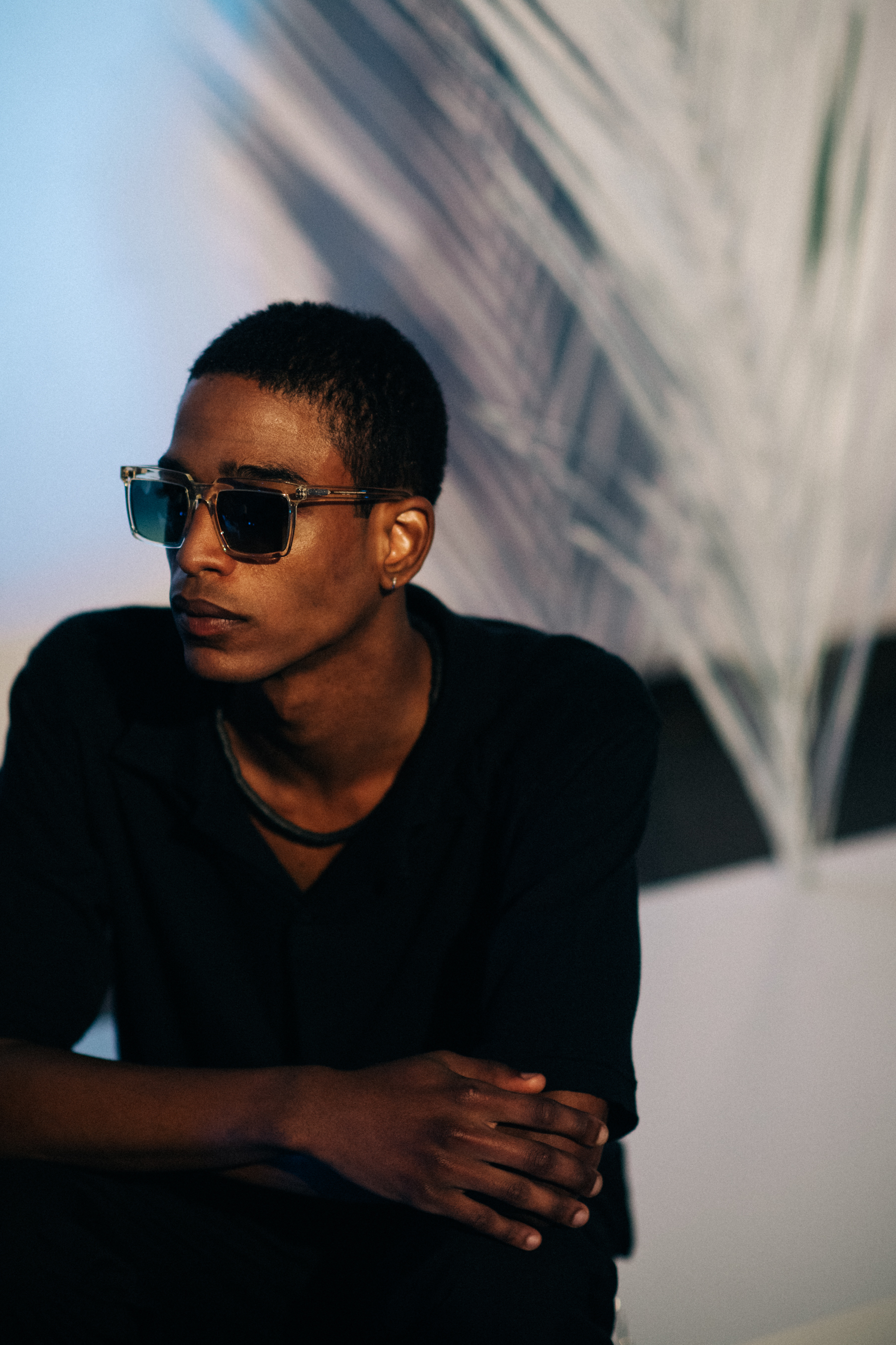 Male model wearing squared frames