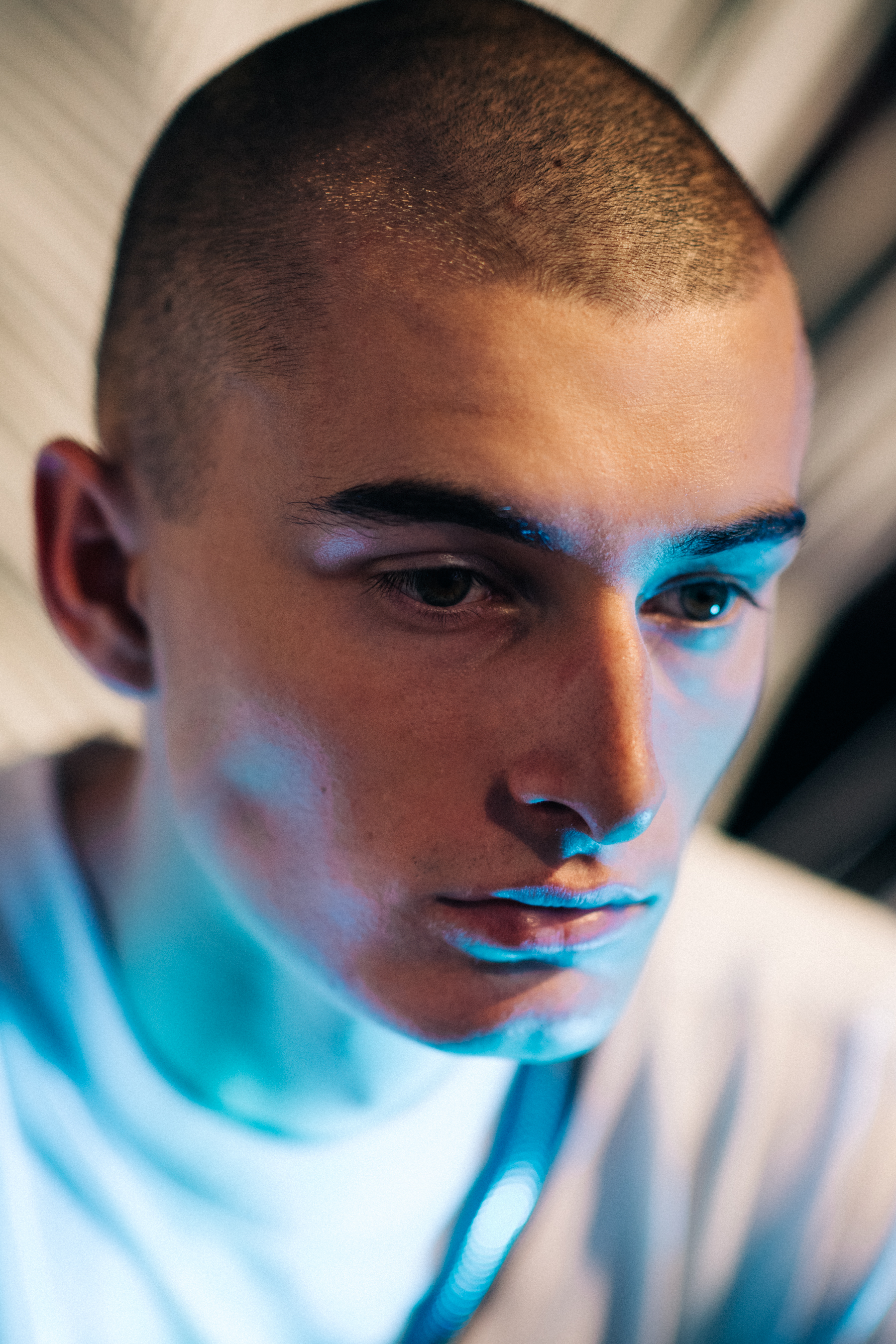 Portrait of a shaved head male model