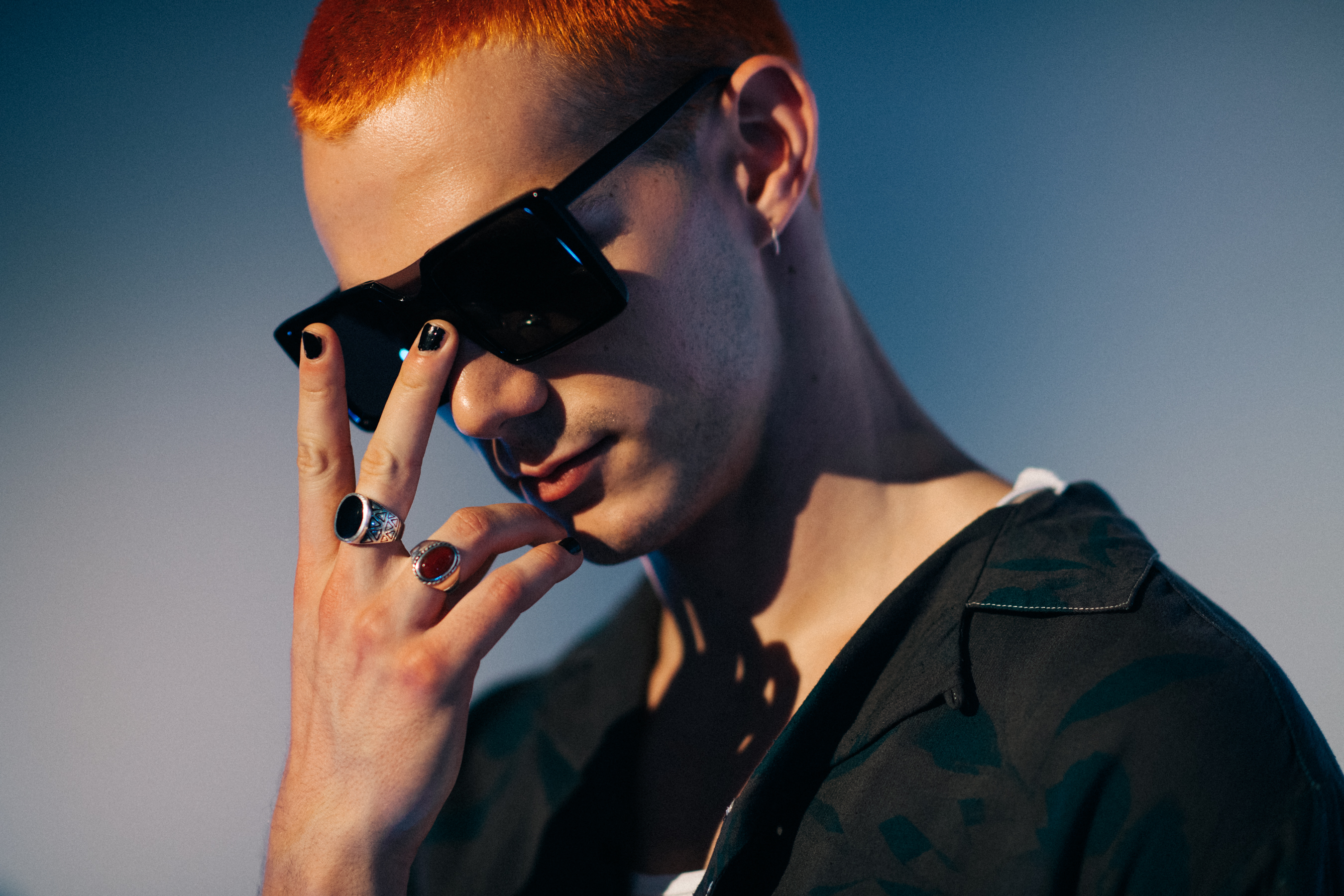 Male model showing peace sign