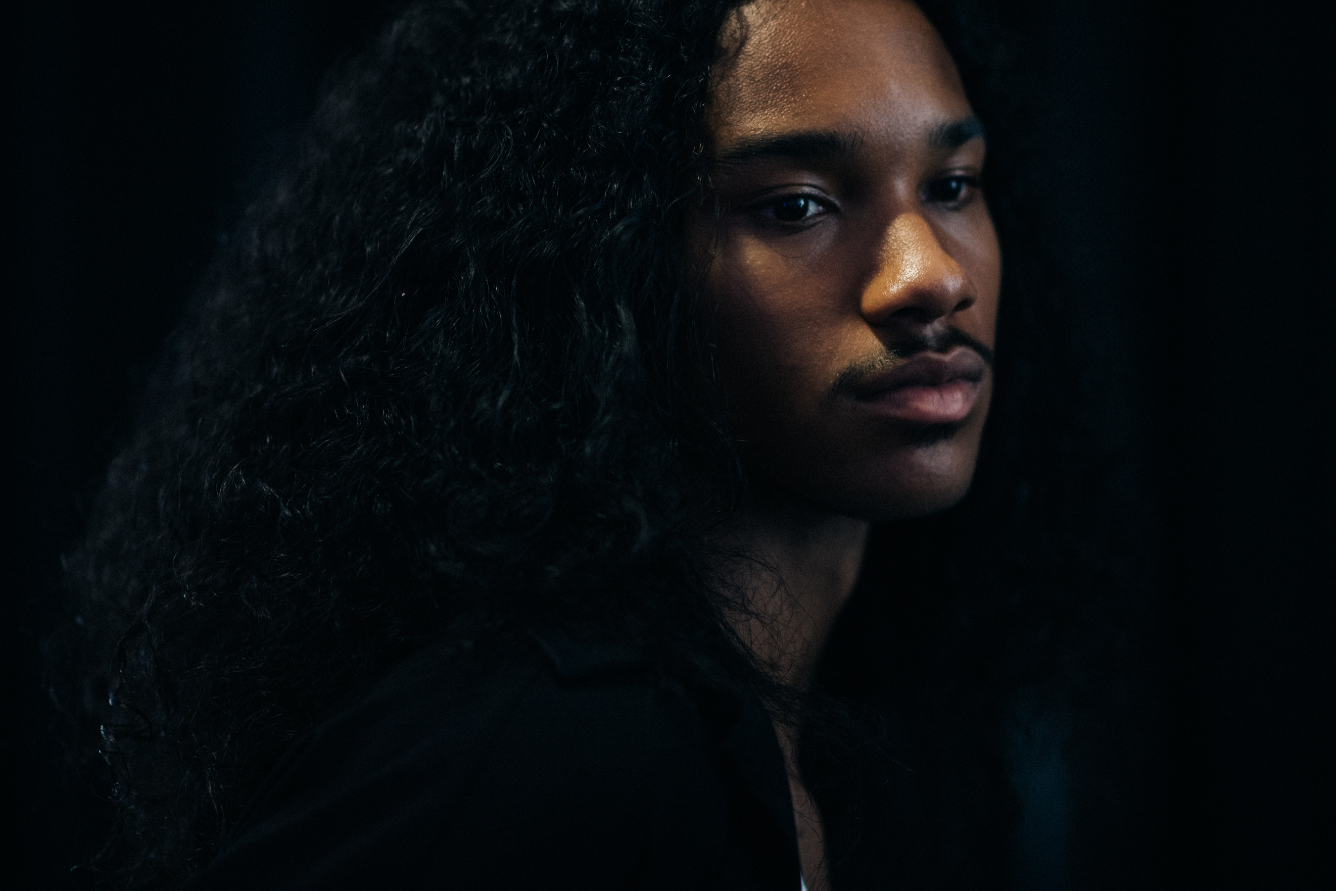 Male model with long black hair