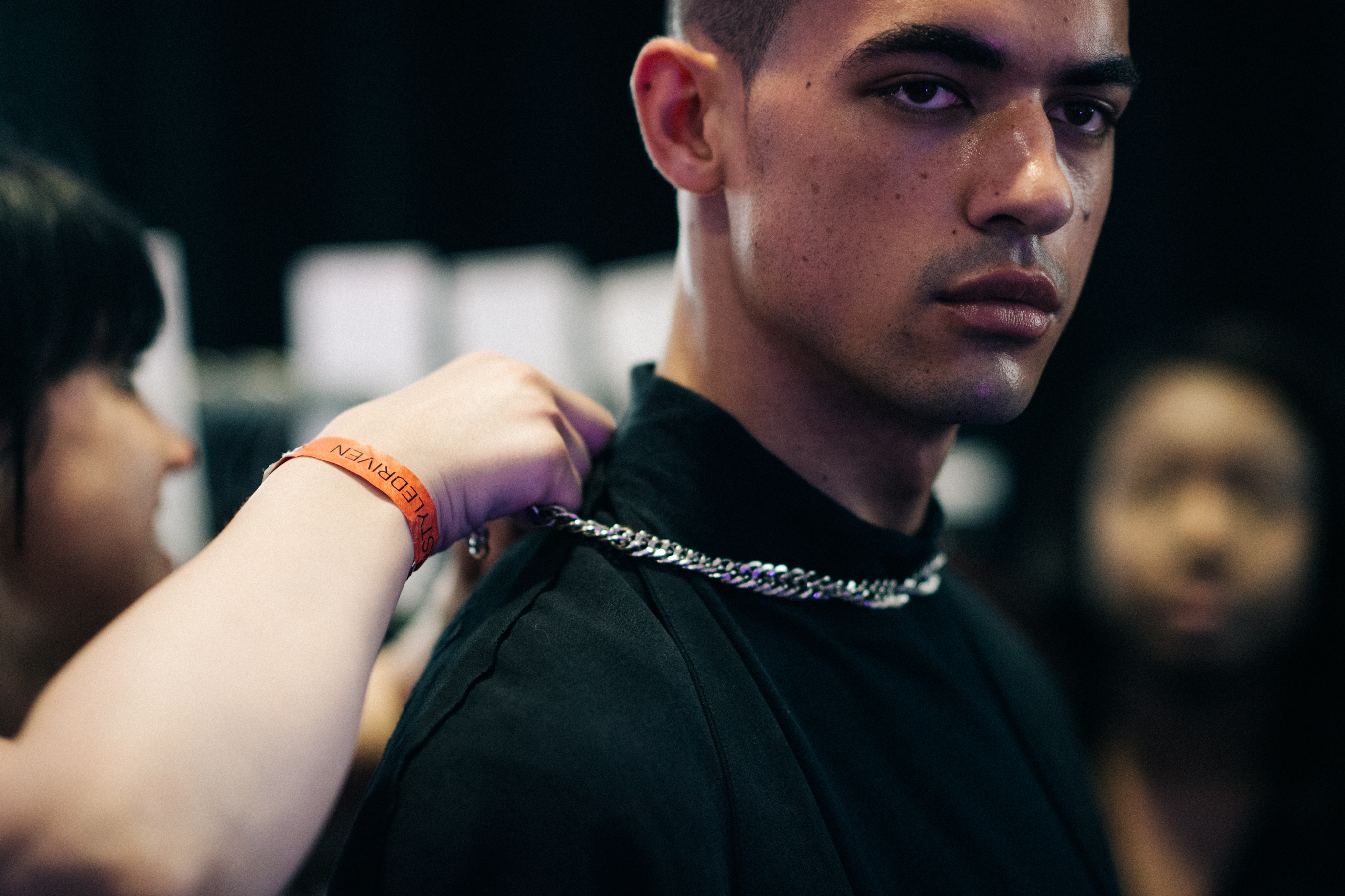 Male model wearing silver chain