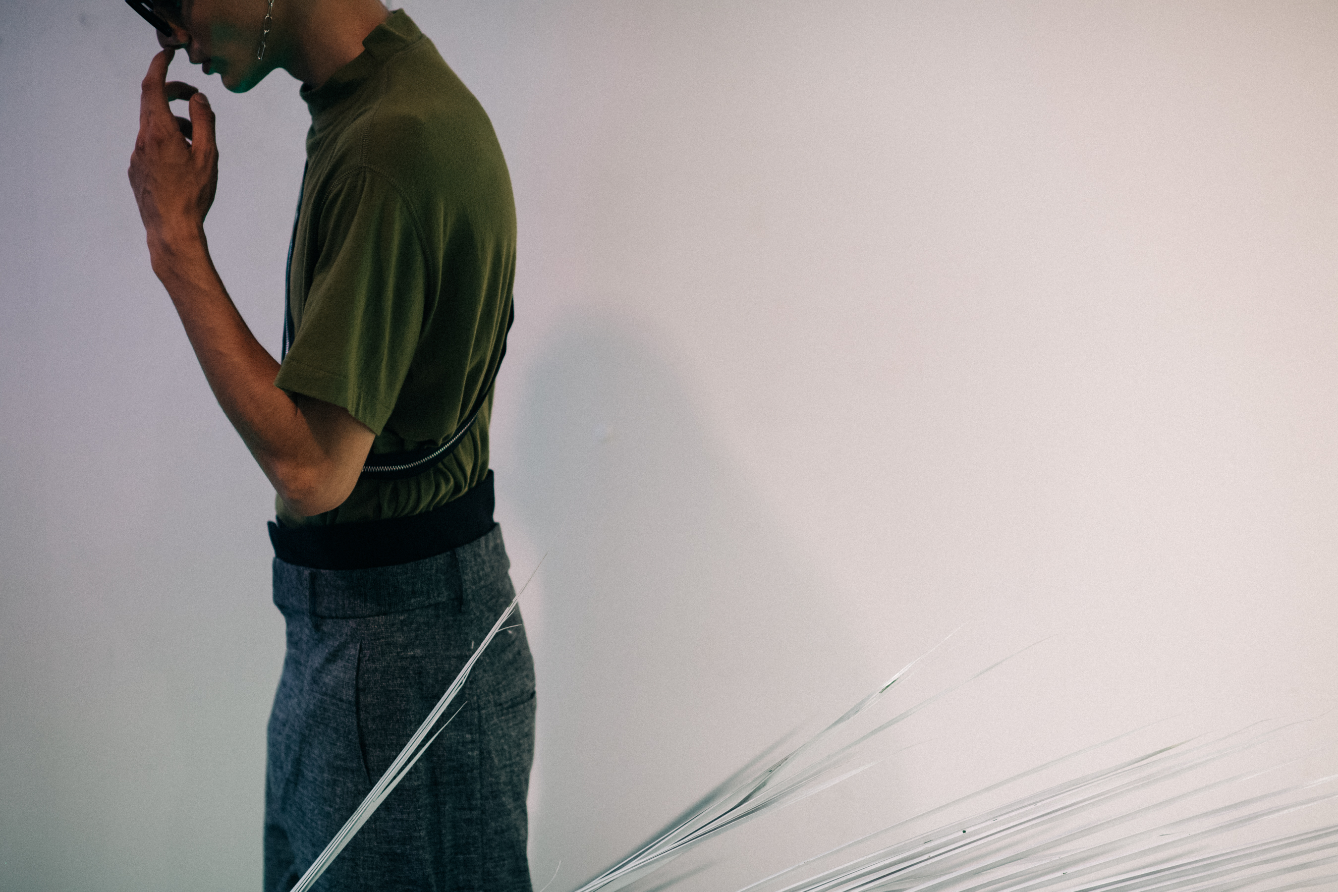 Male model dressed in grey pants