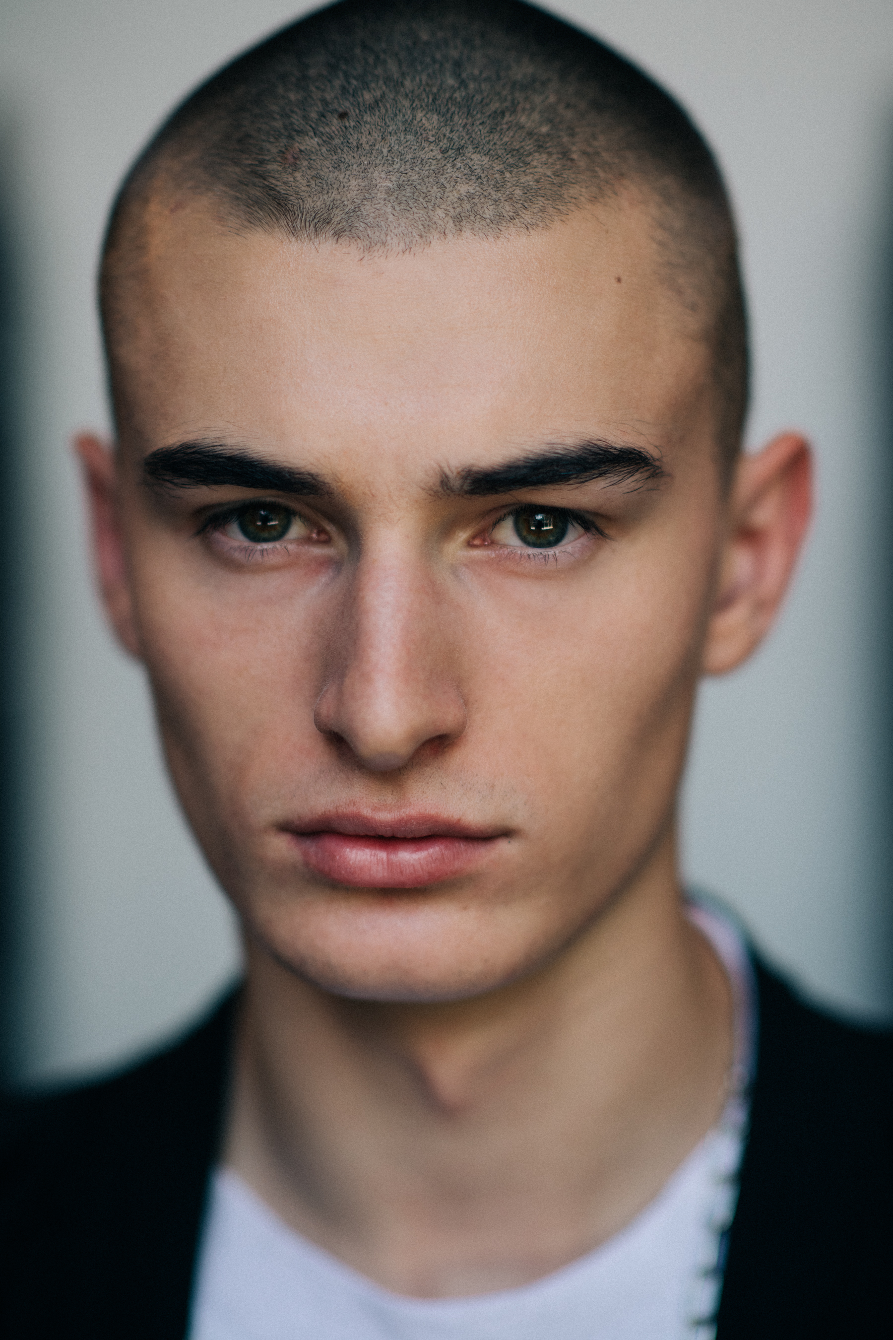 Portrait of a shaved head male model