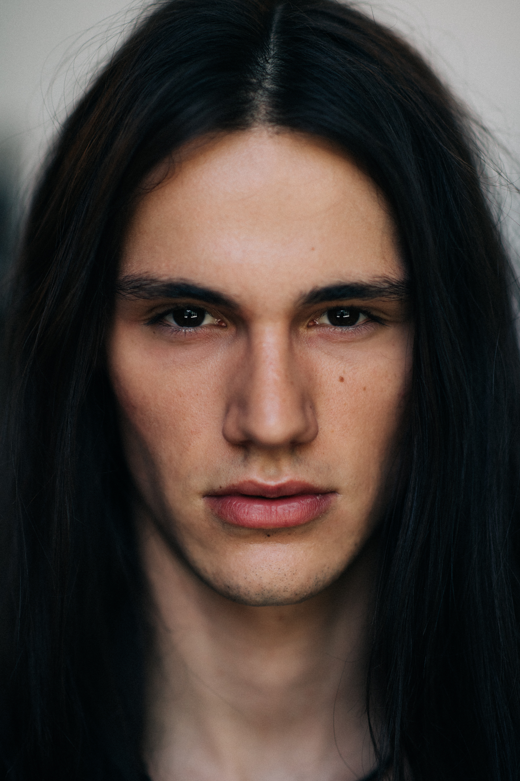 Portrait of a male model long hair