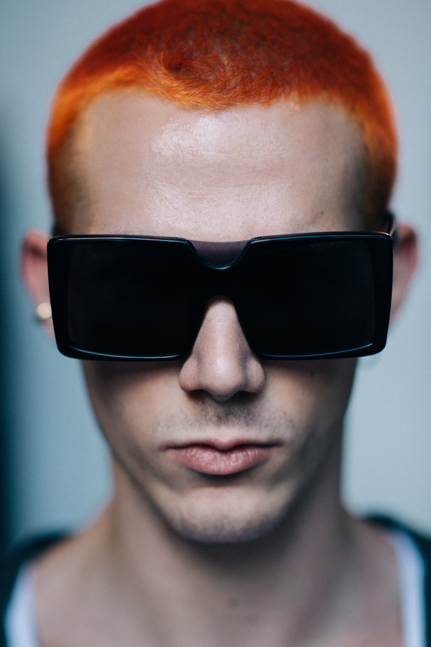 Portrait male model bright orange hair