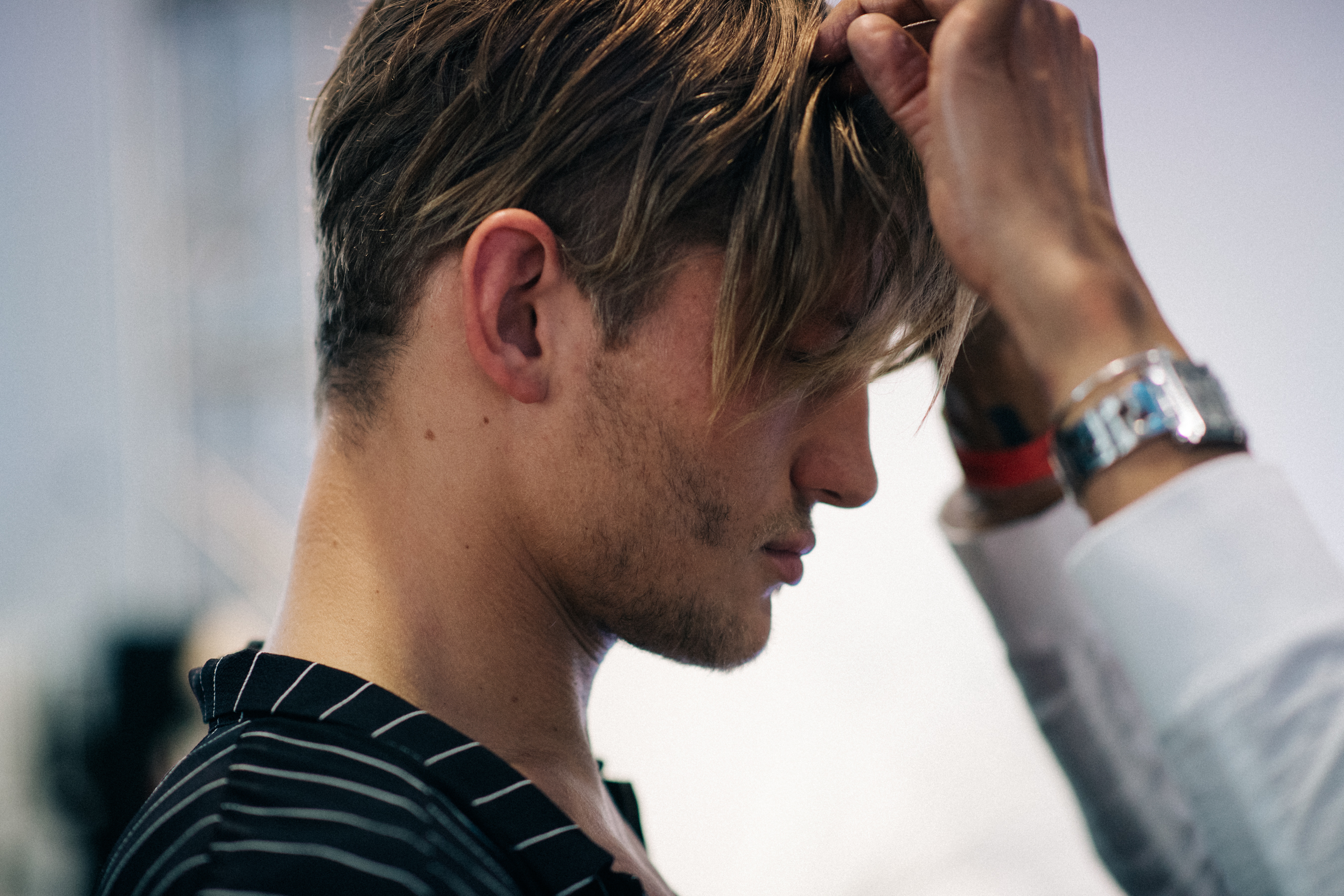 Male model getting hair done