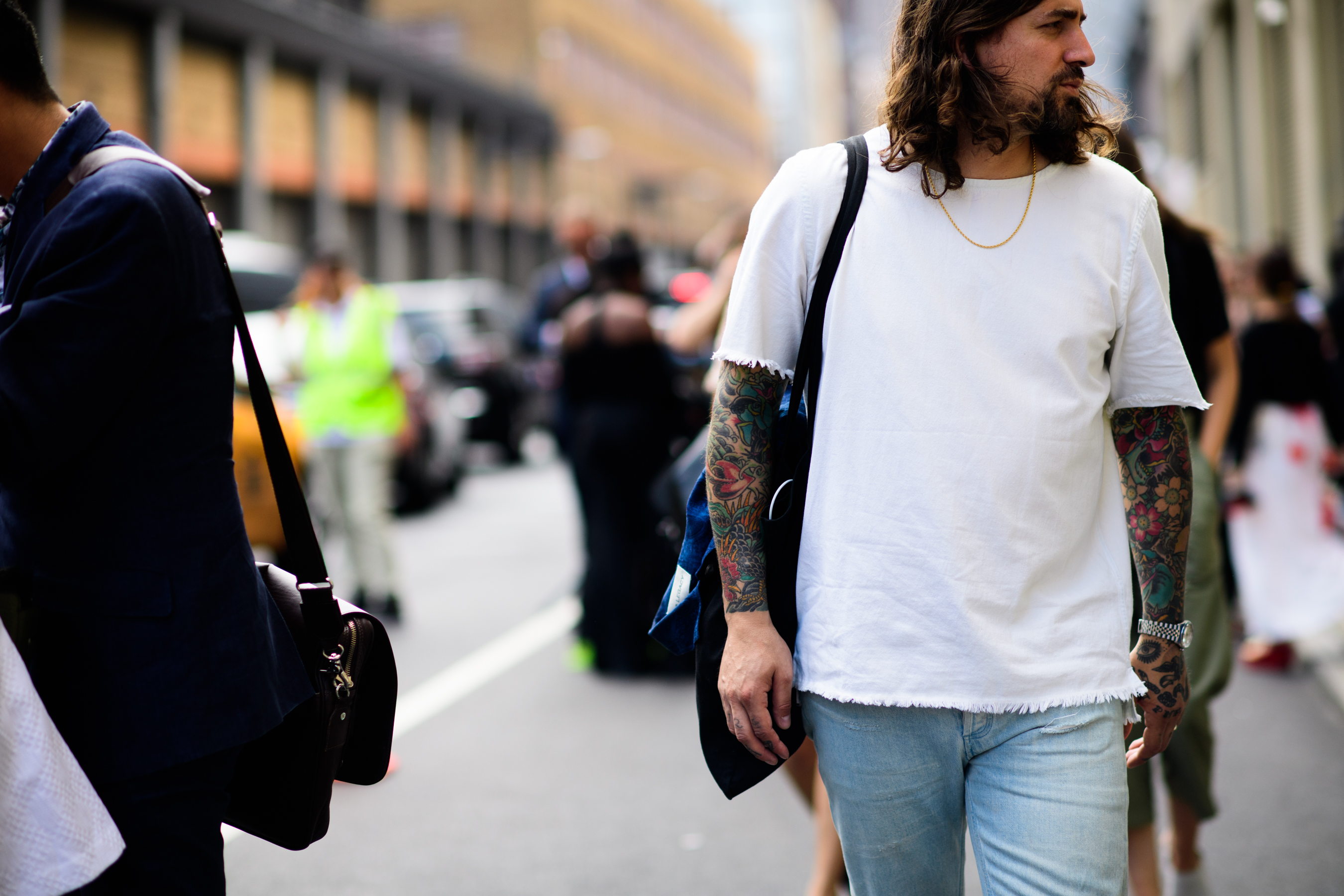 Man wearing ruffled denim shirt