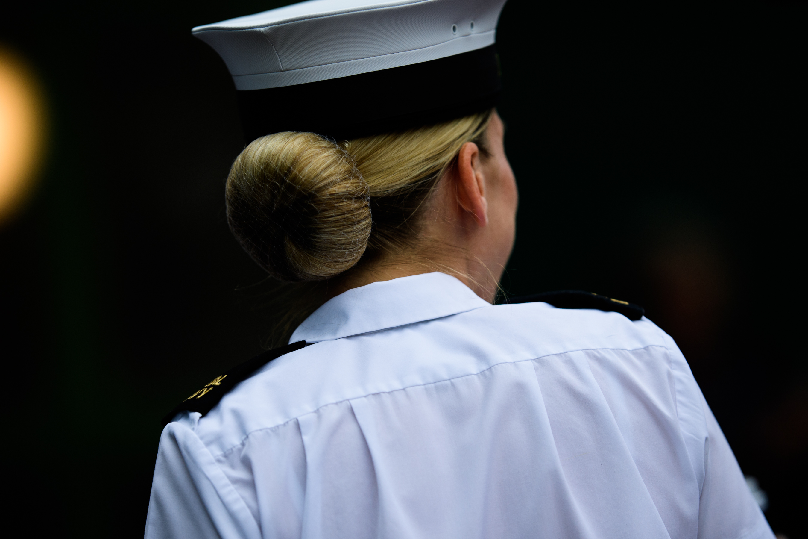 Woman wearing white navy uniform