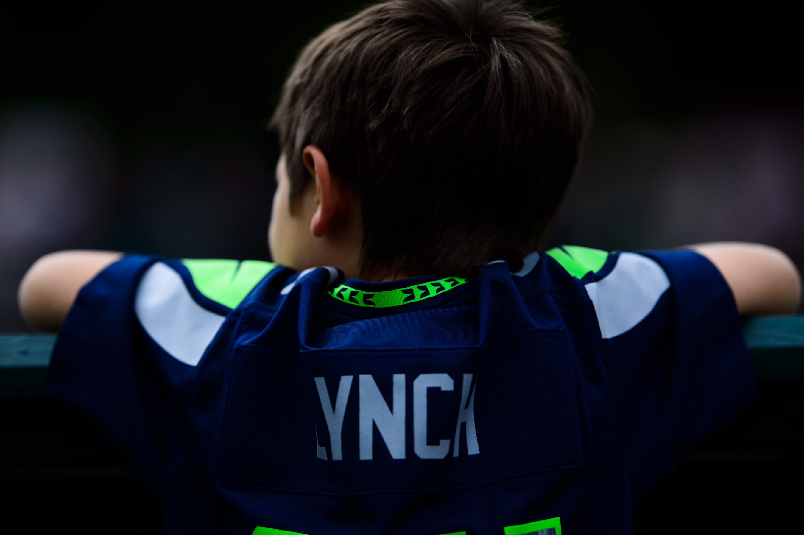 Little boy watching tennis tournament