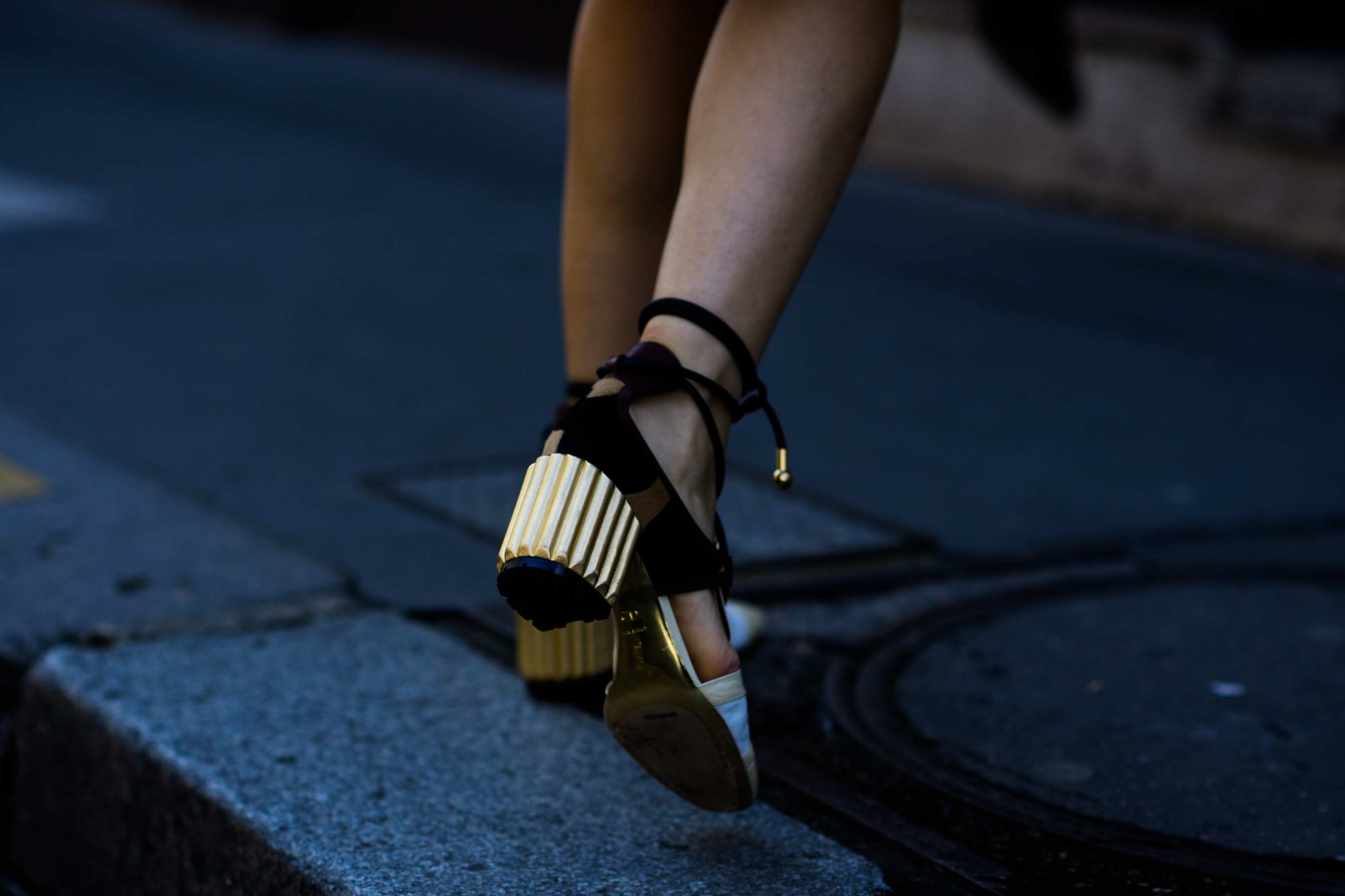 Shoe with golden heel detail