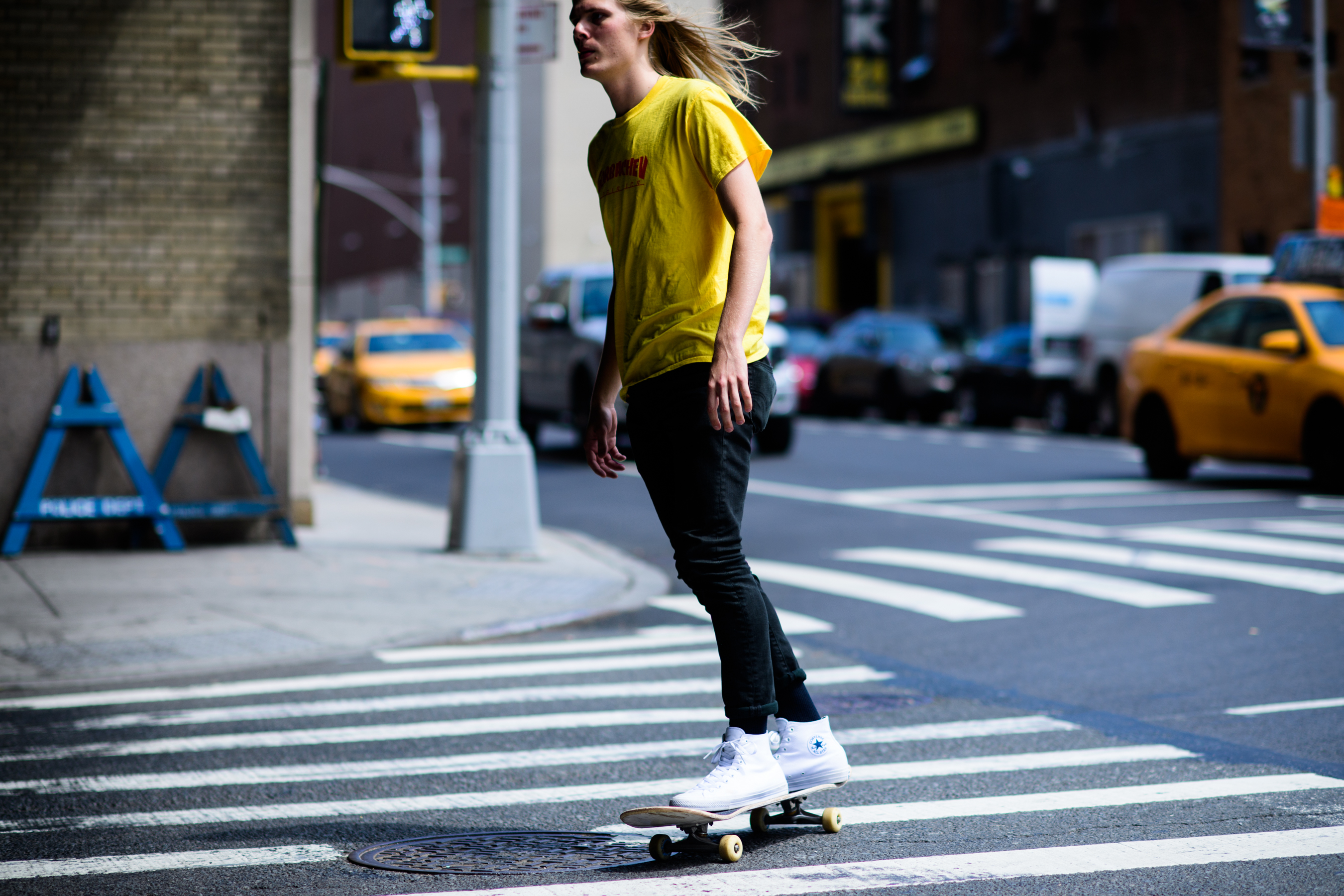 Male model on skate wearing yellow