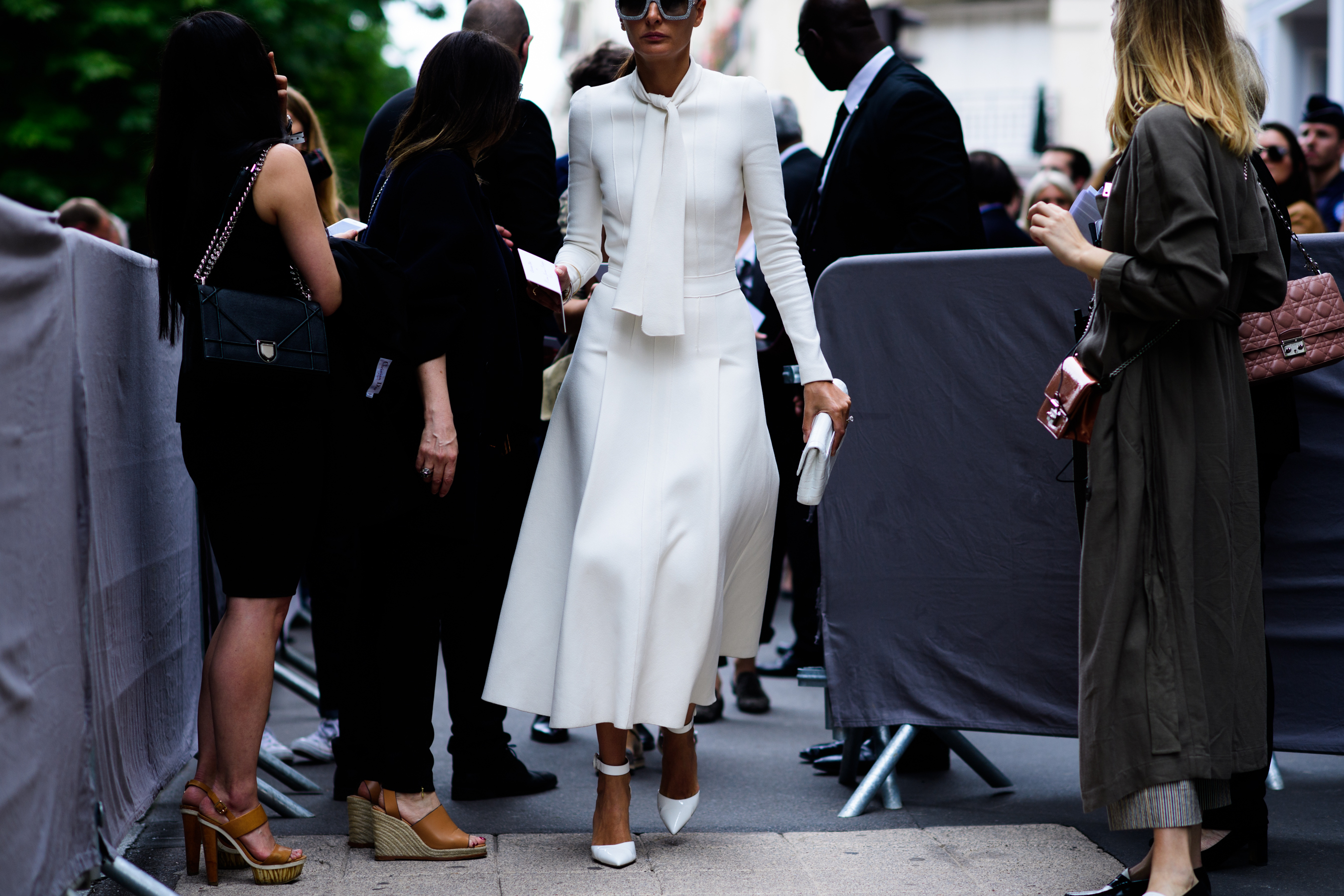 Italian stylist in white outfit