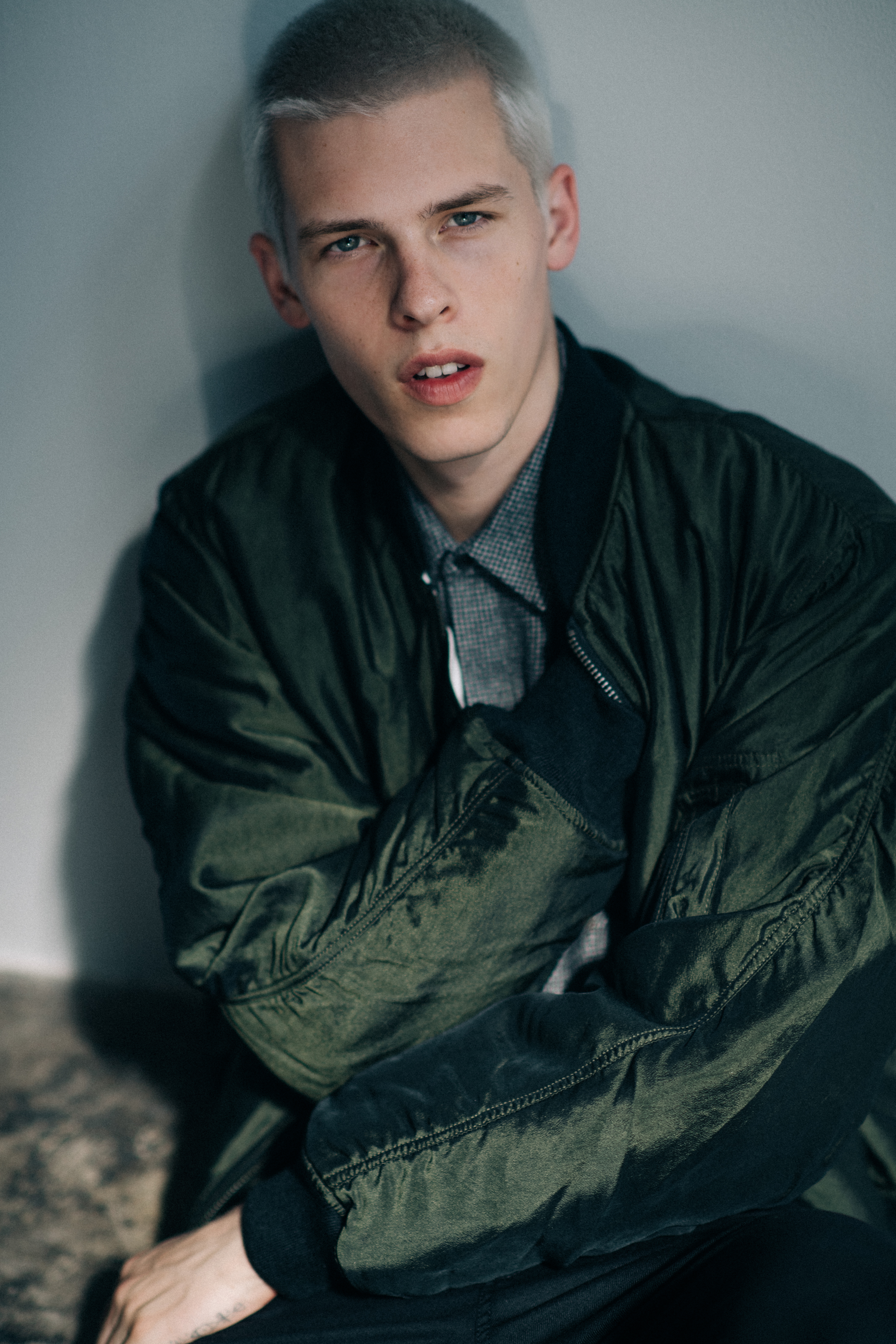 Male model wearing green bomber