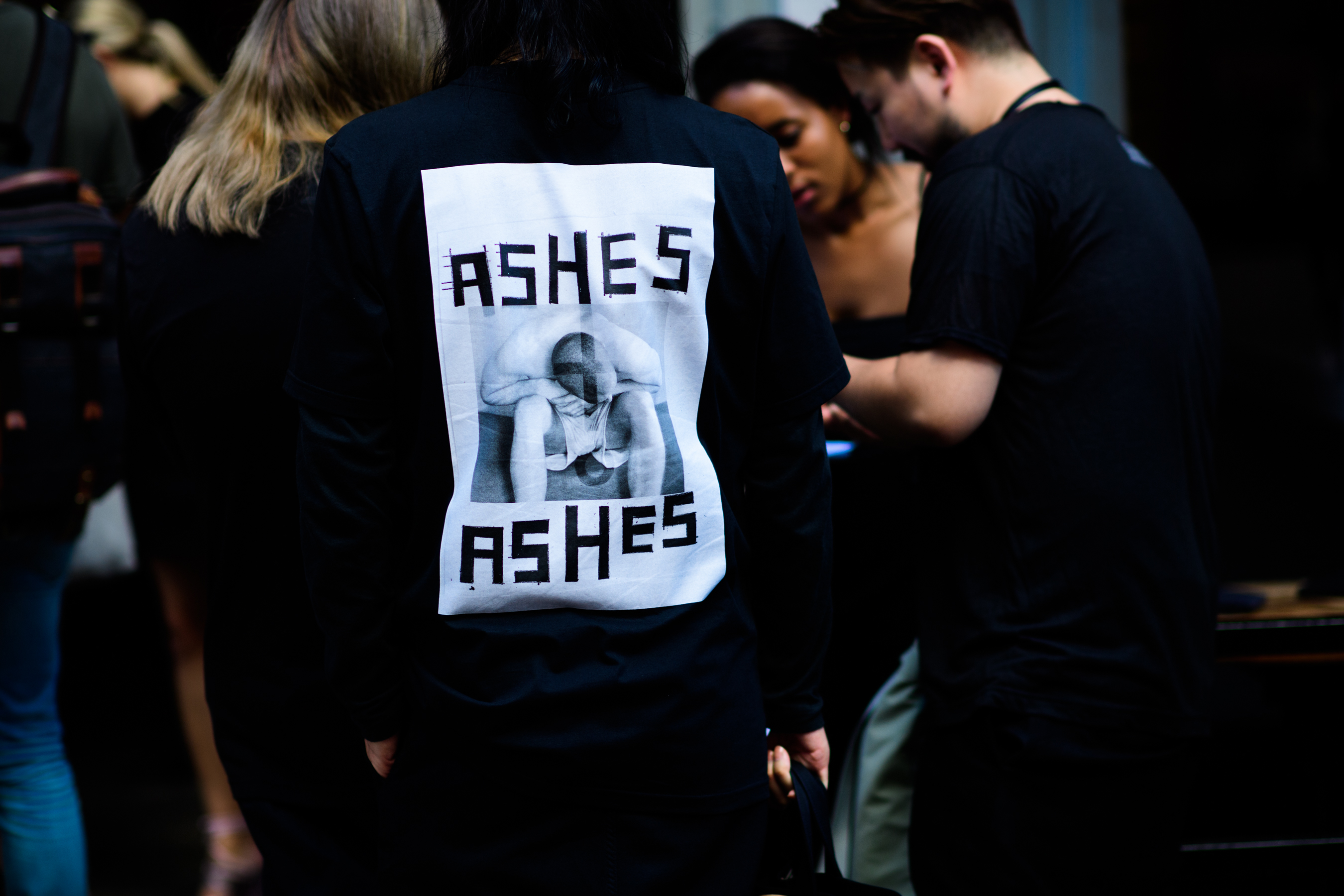 Man wearing Dust magazine shirt