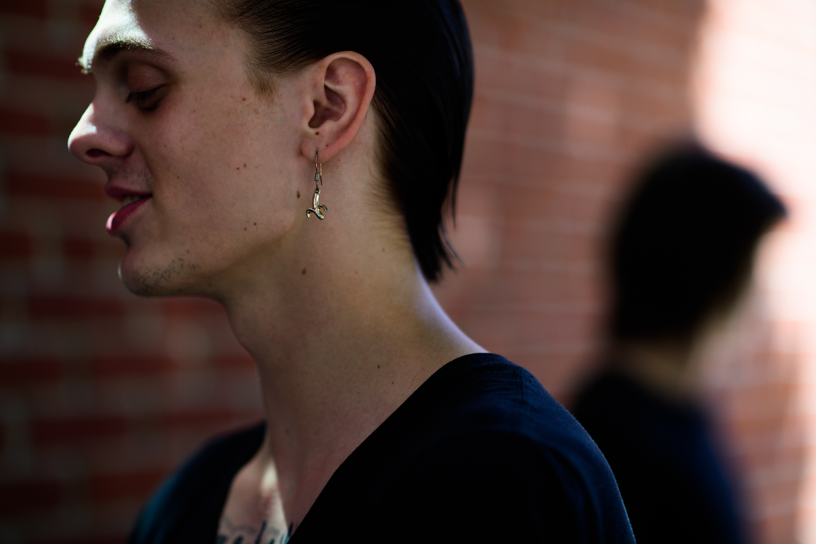 Male model with banana earring