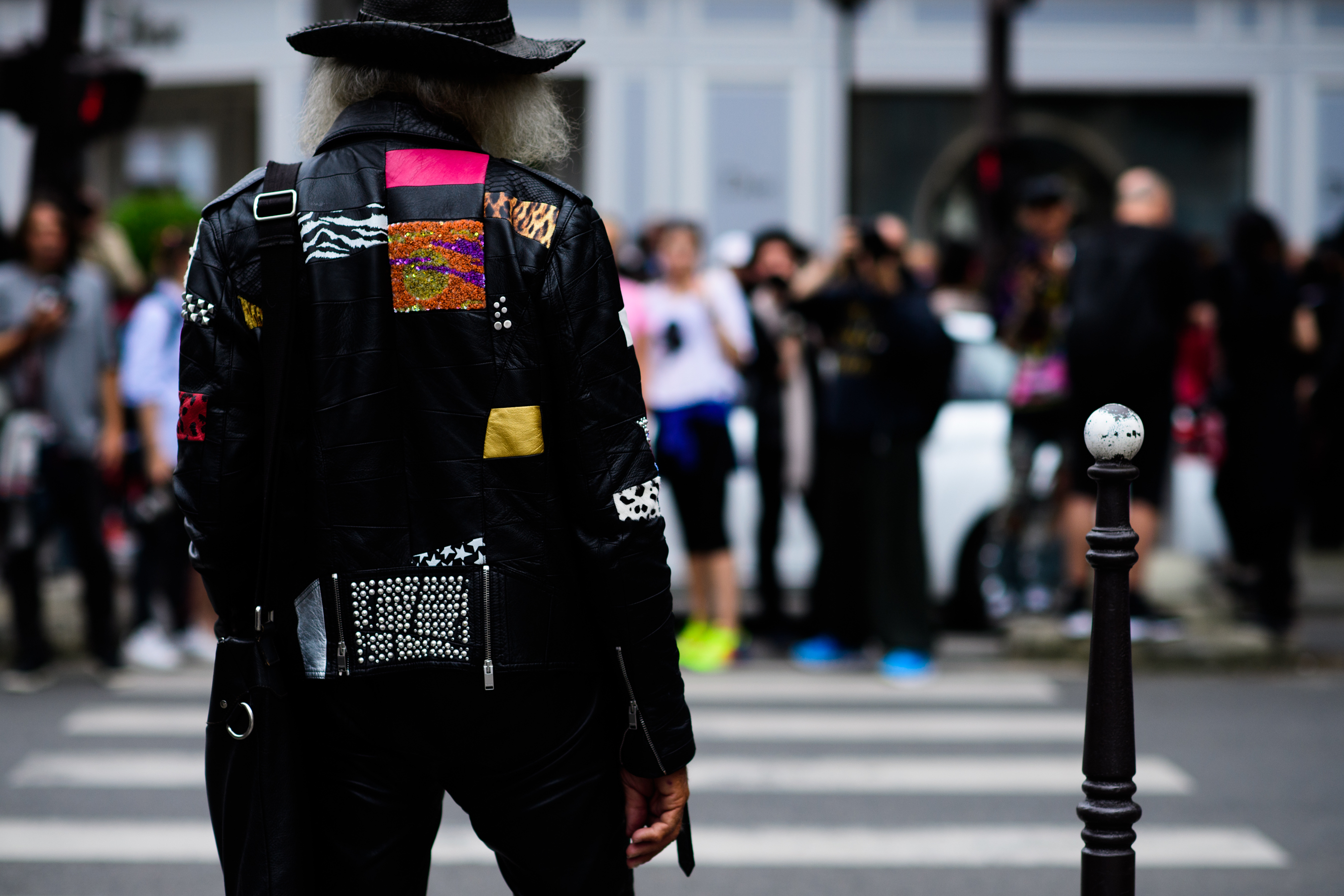 Man in jacket with patchwork