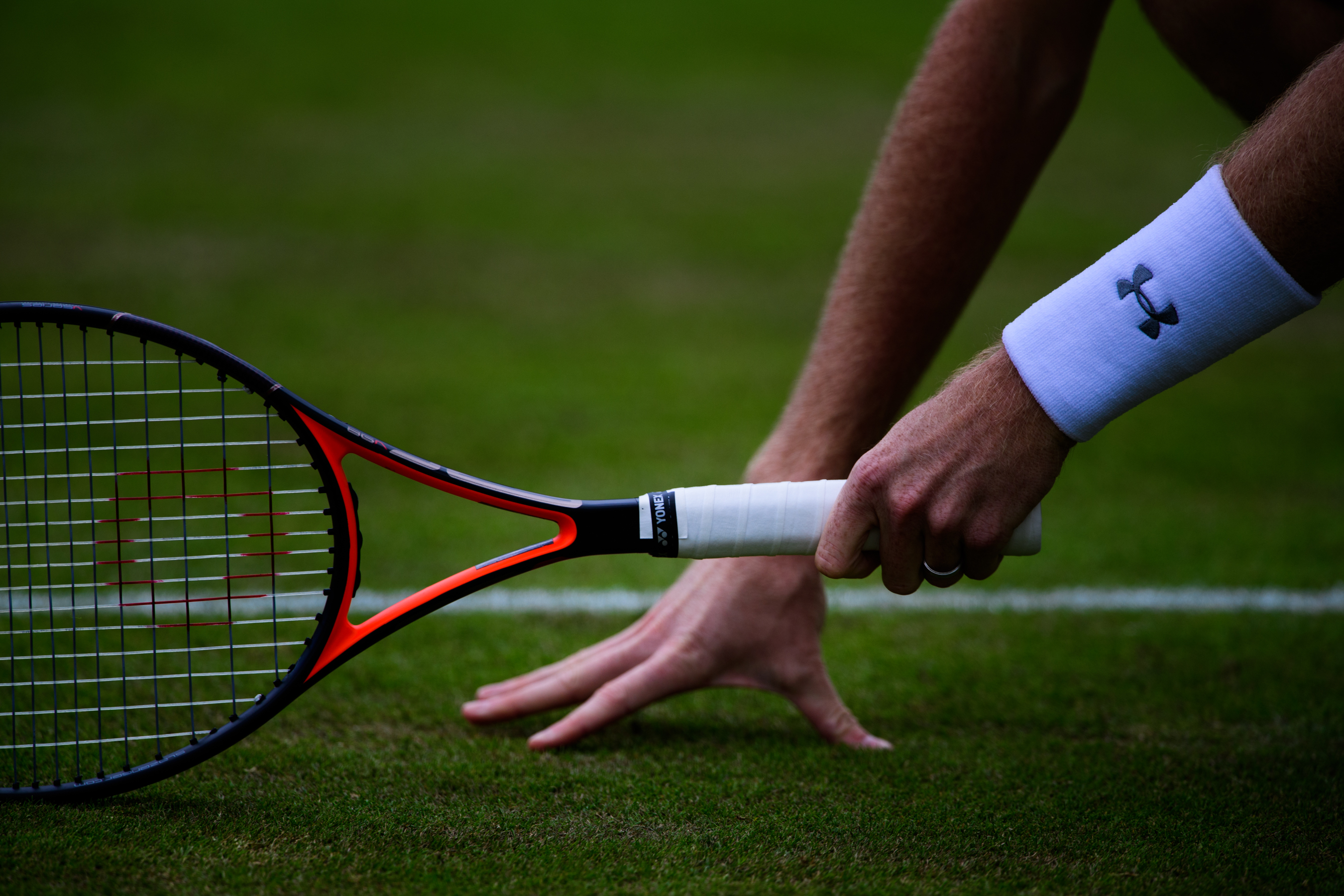 Professional British tennis player holding rocket