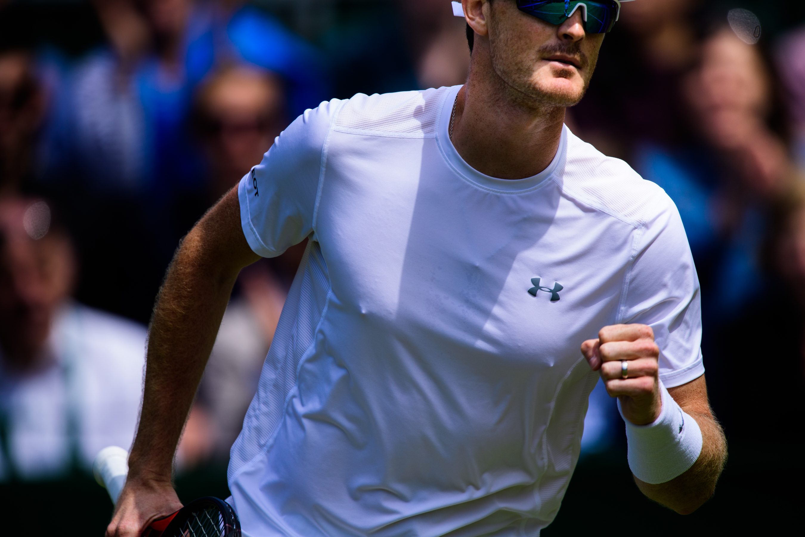 Professional British tennis player wearing white