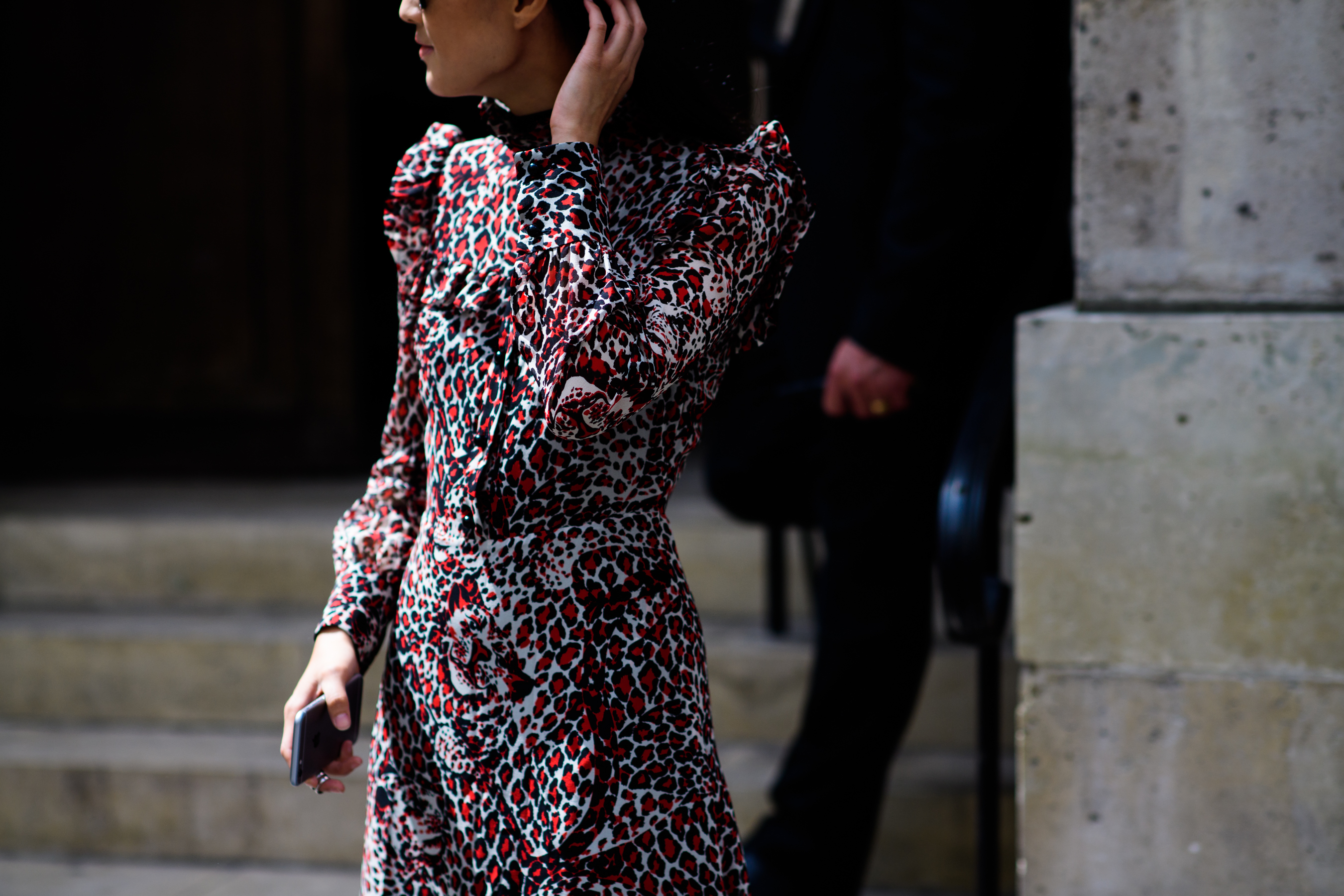 Woman in colourful printed dress