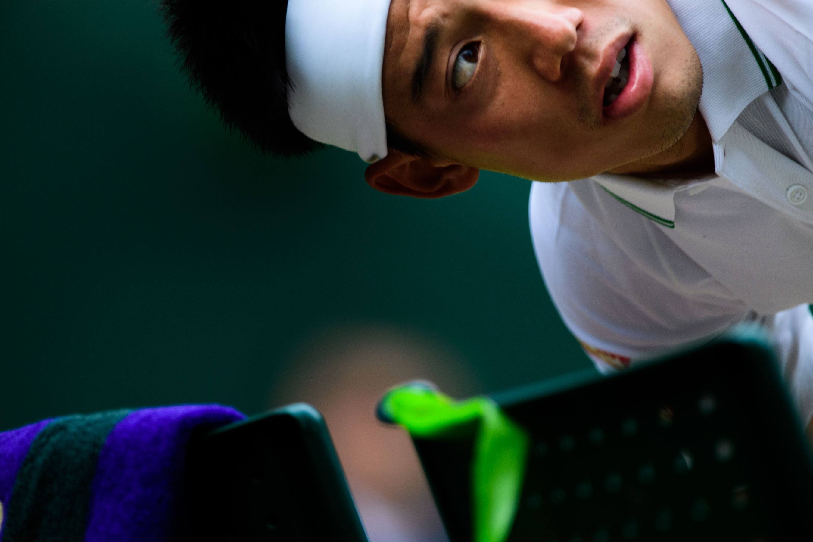 Japanese tennis player white head band