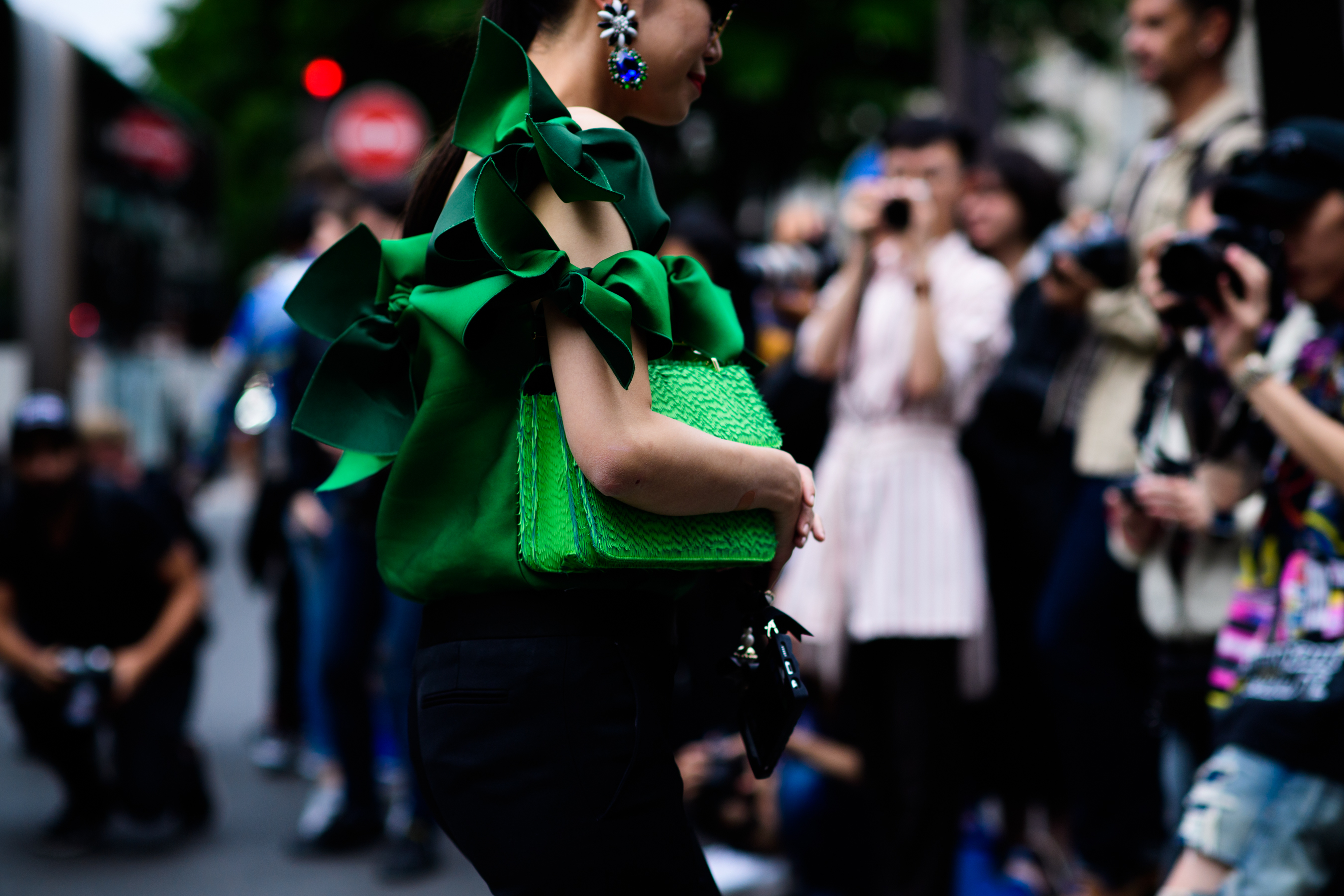 Female wearing bright green outfit