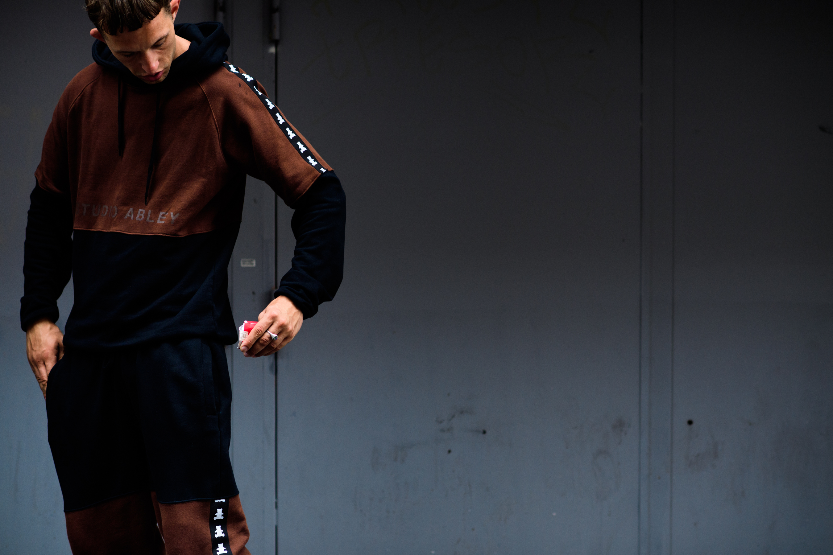 Male model wearing brown outfit