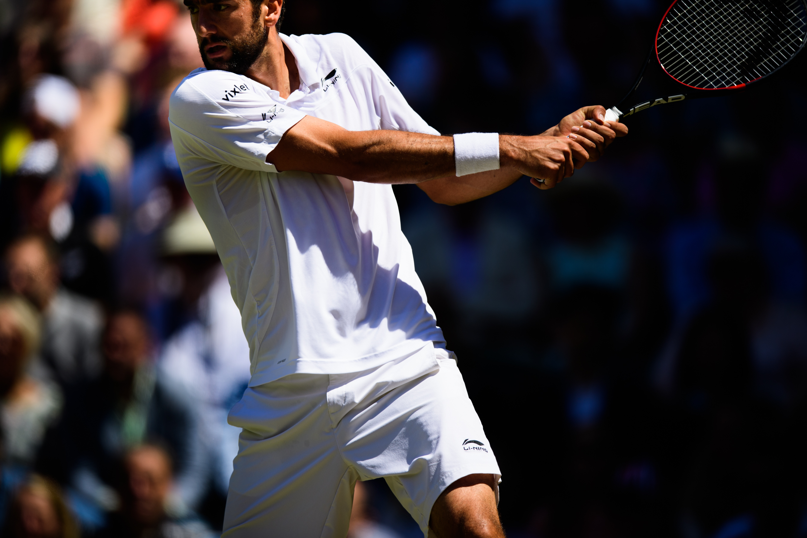 Croatian professional tennis player wearing white