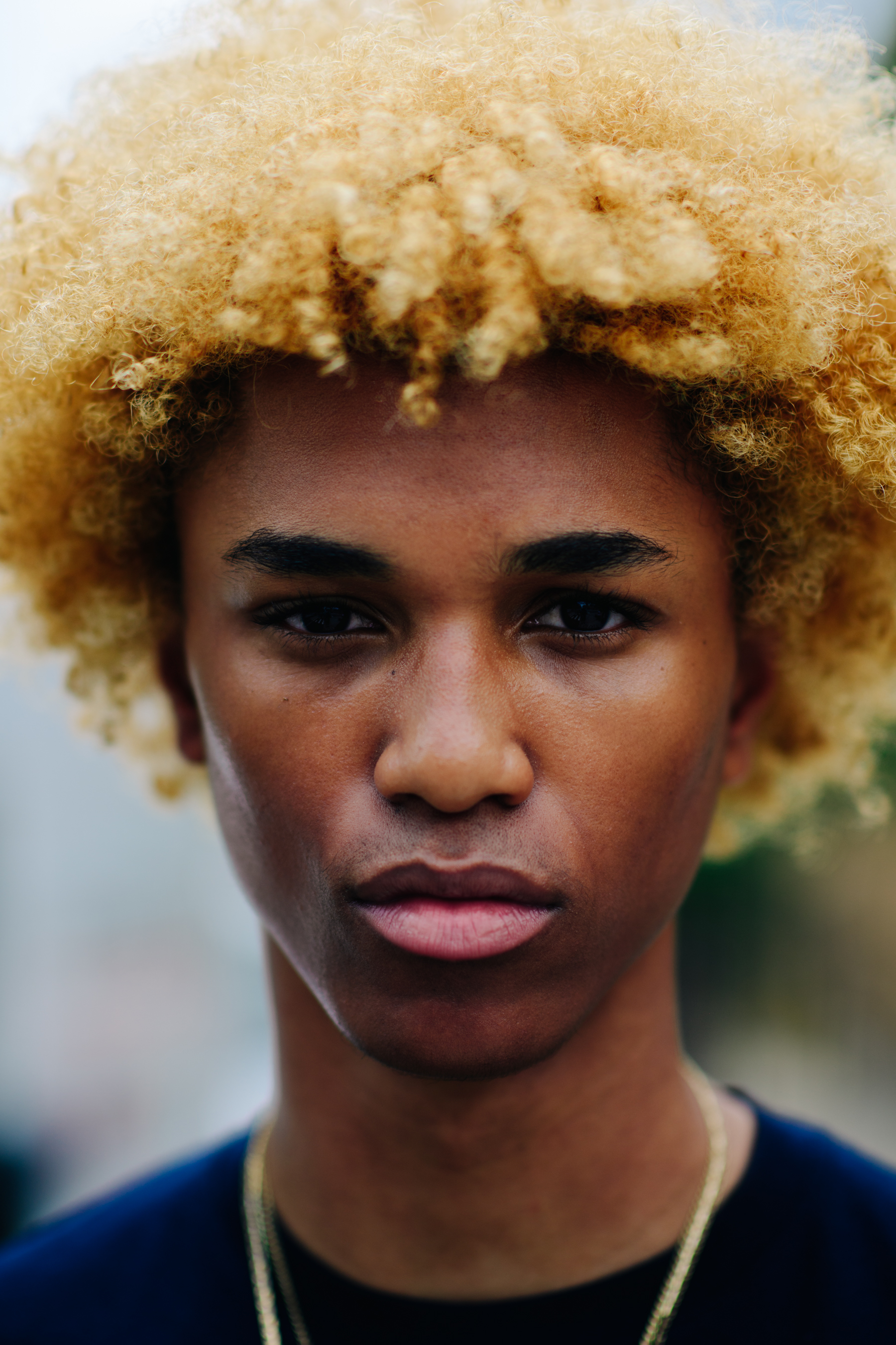 Portrait of a male model with gold hair