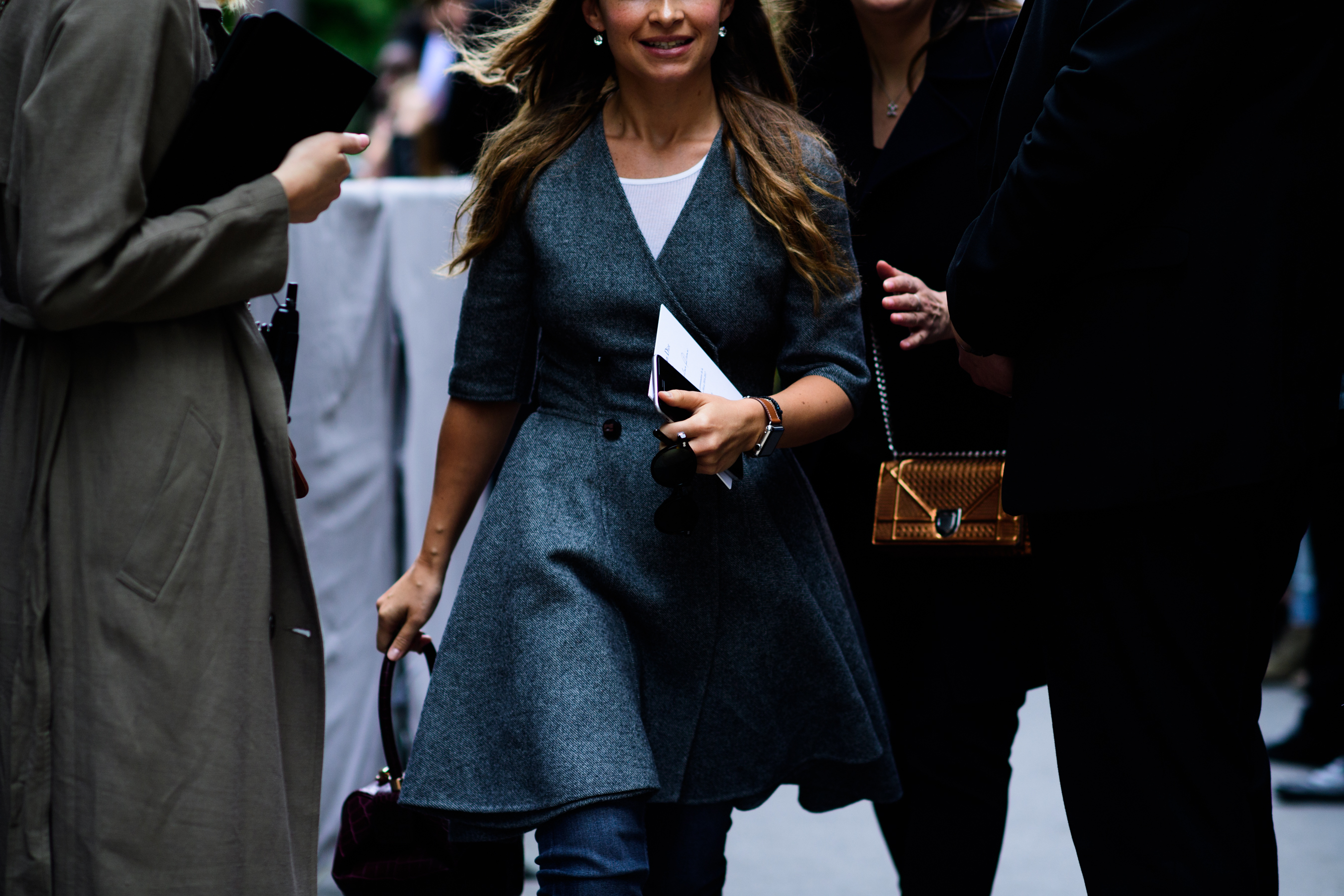Woman in dark grey dress