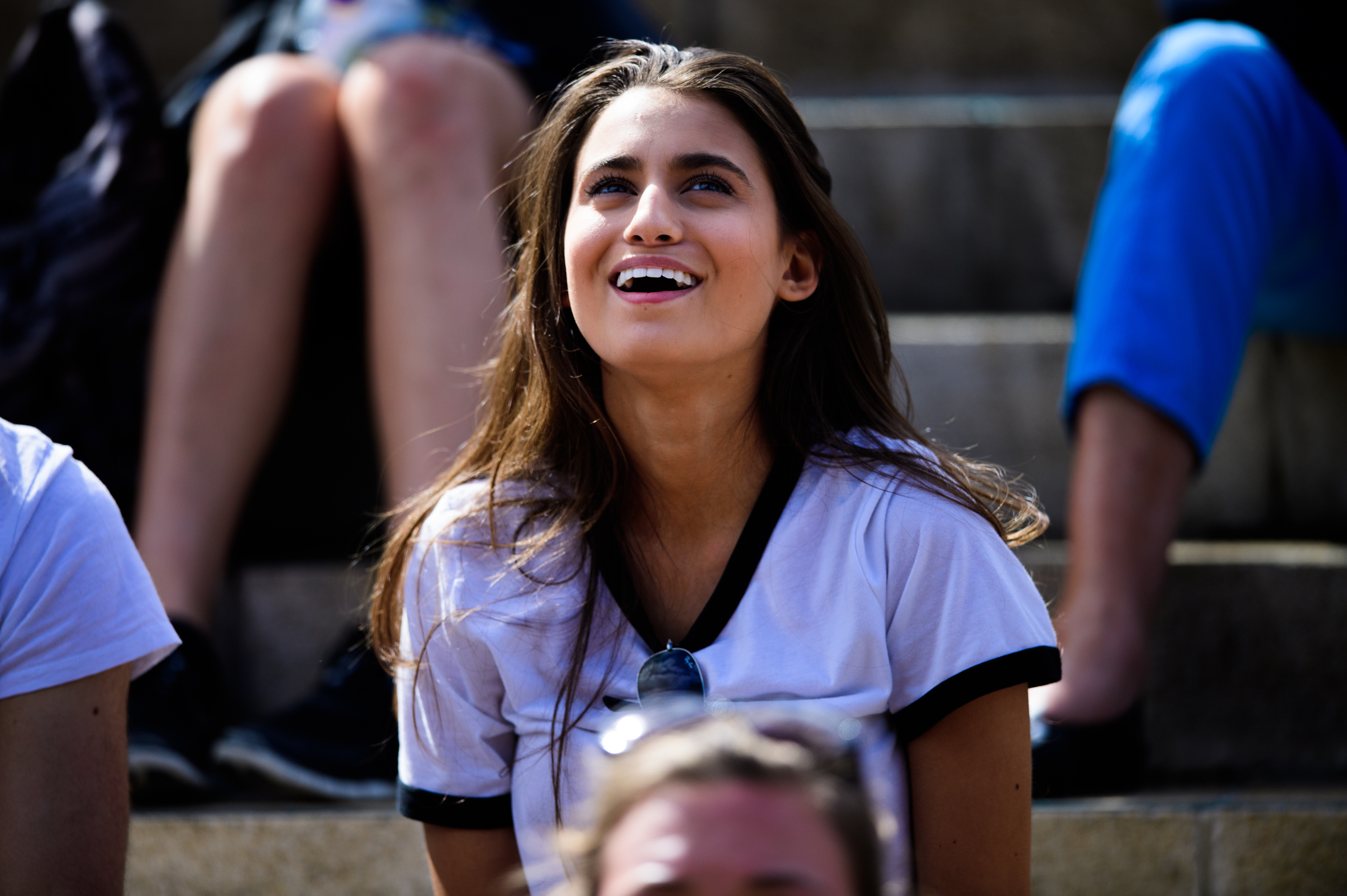 Pretty woman watching tennis match