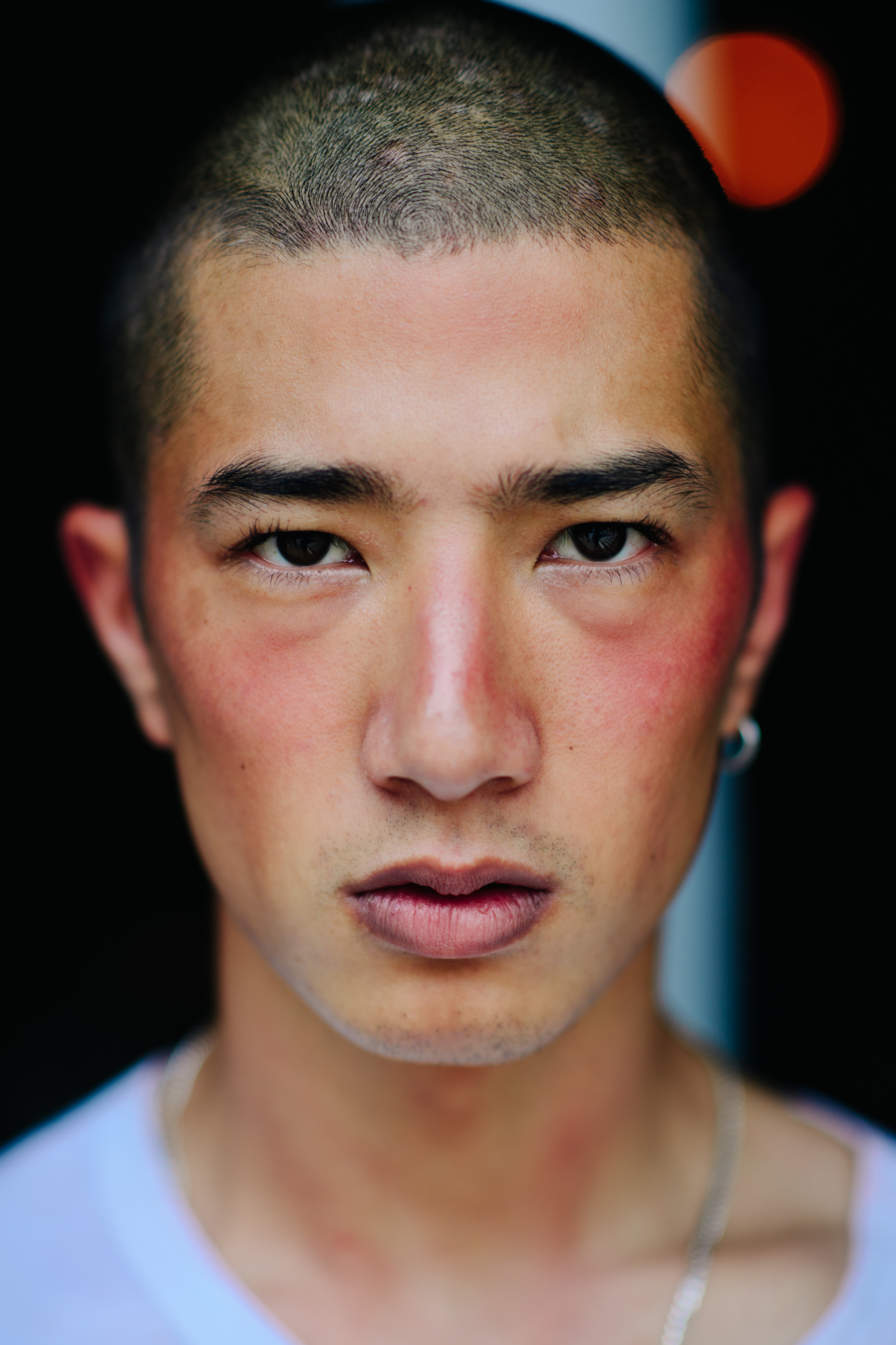 Portrait of male model sunburnt make up