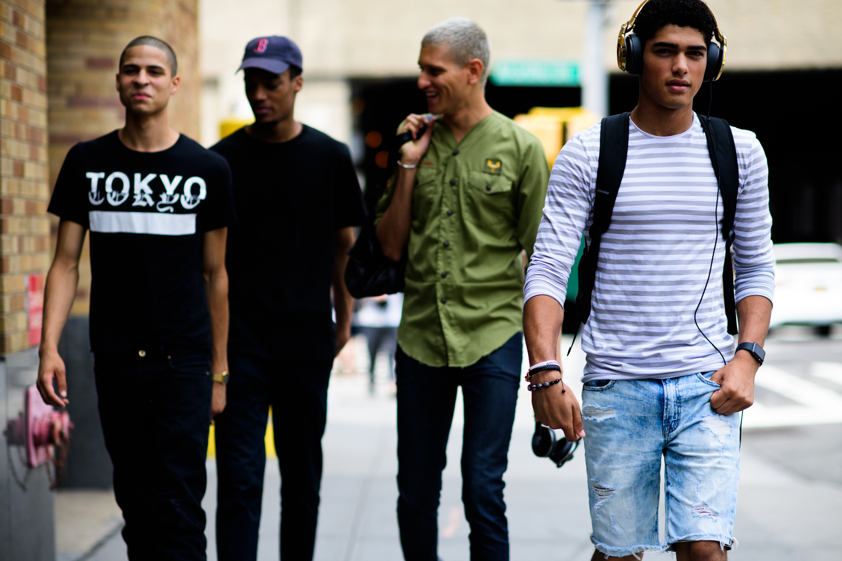 Group of male models after the show