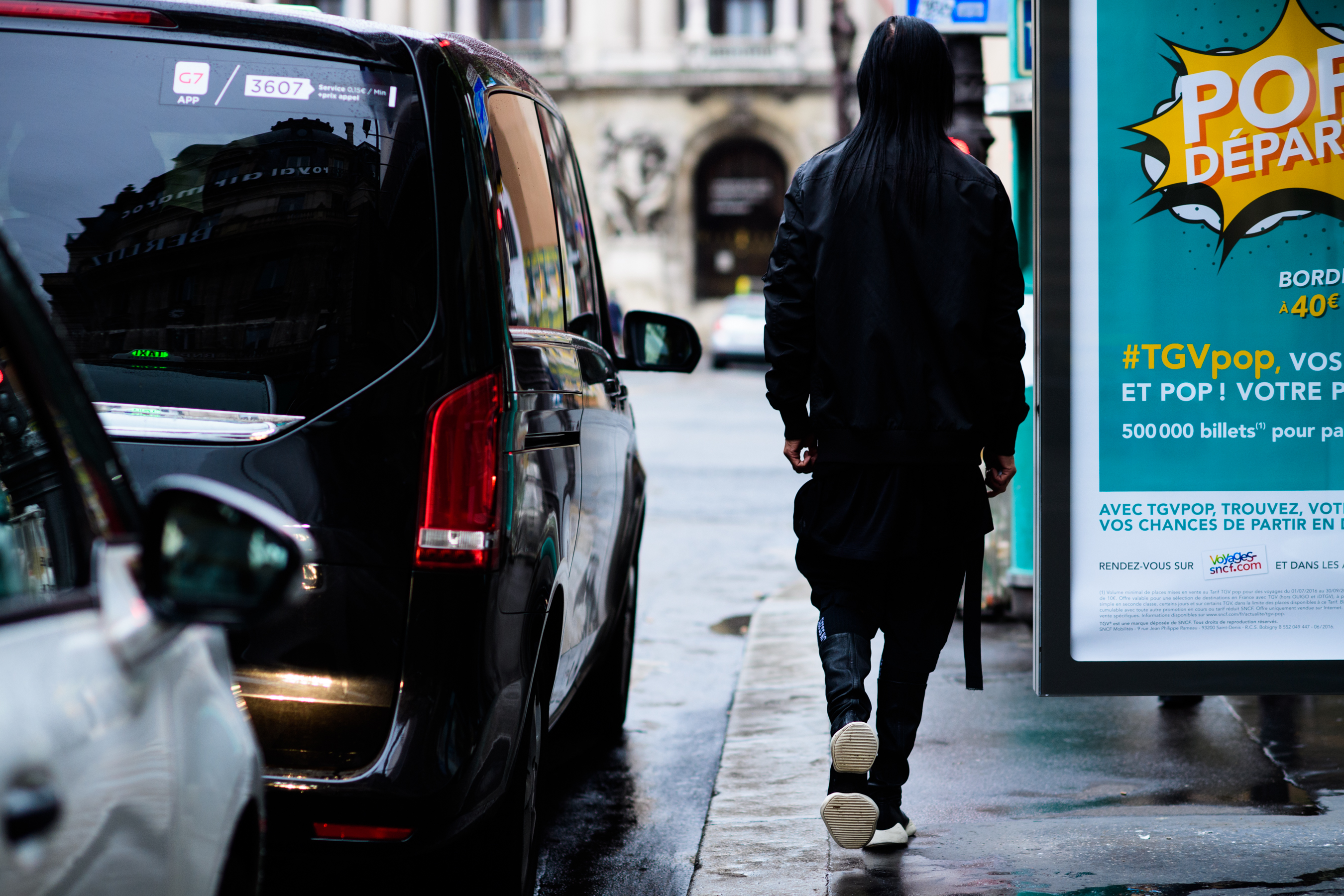 Man wearing all black outfit