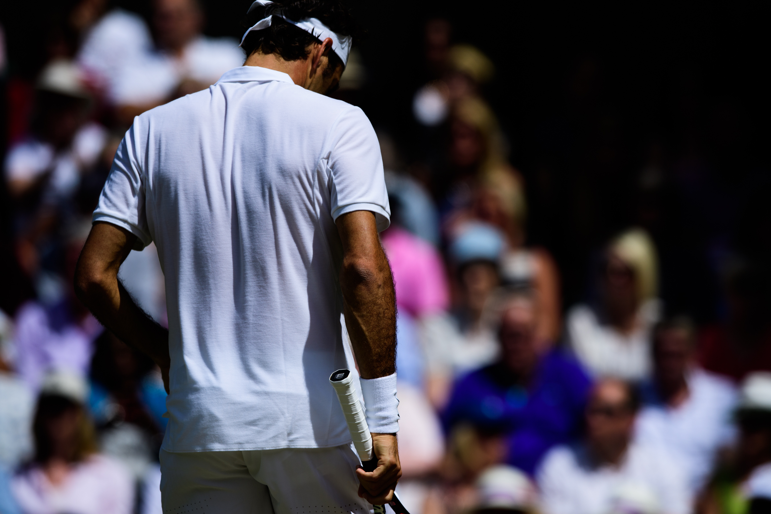 Professional Swiss tennis player wearing white