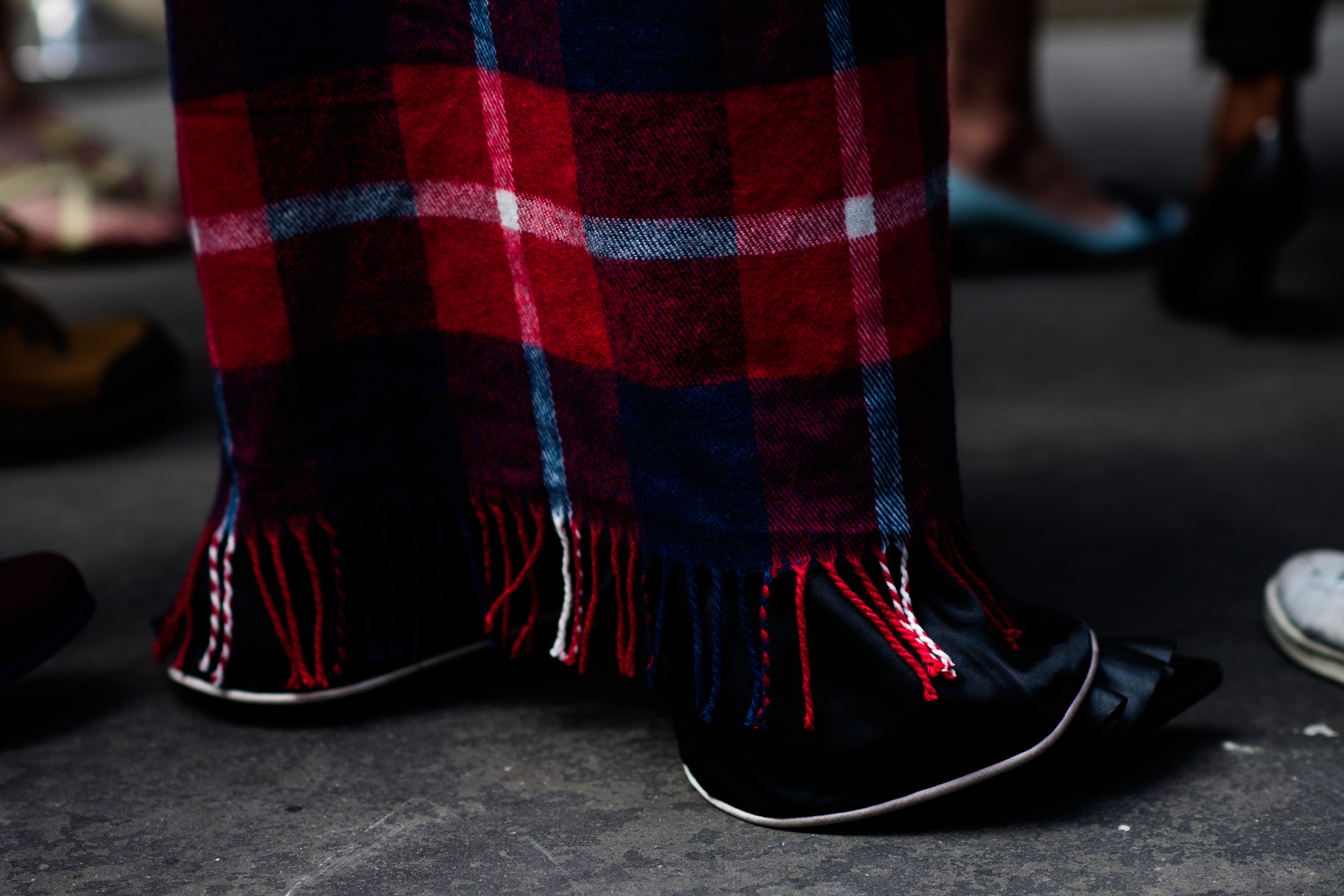 Close up of blanket and pyjama pants