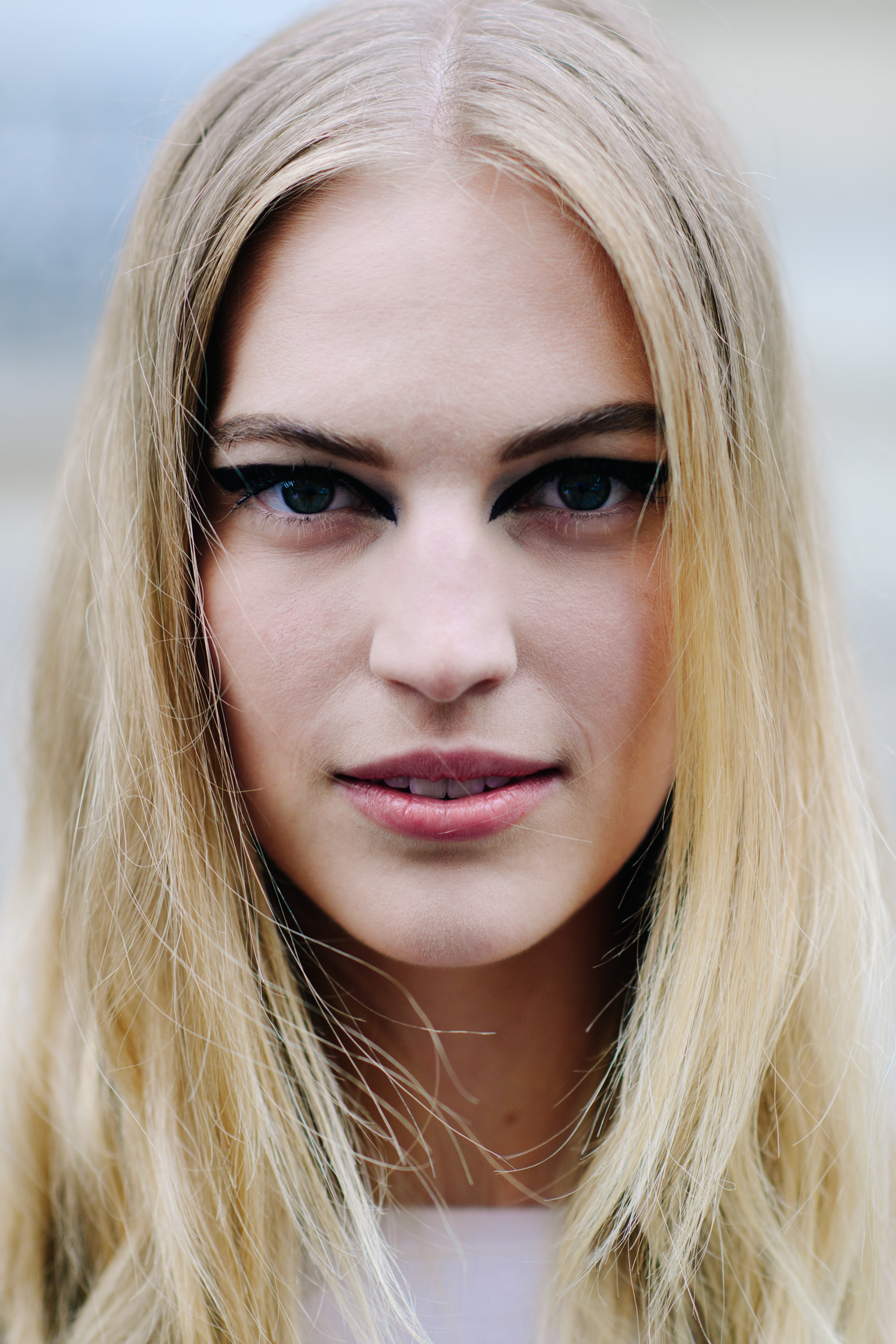 Blonde female model after show