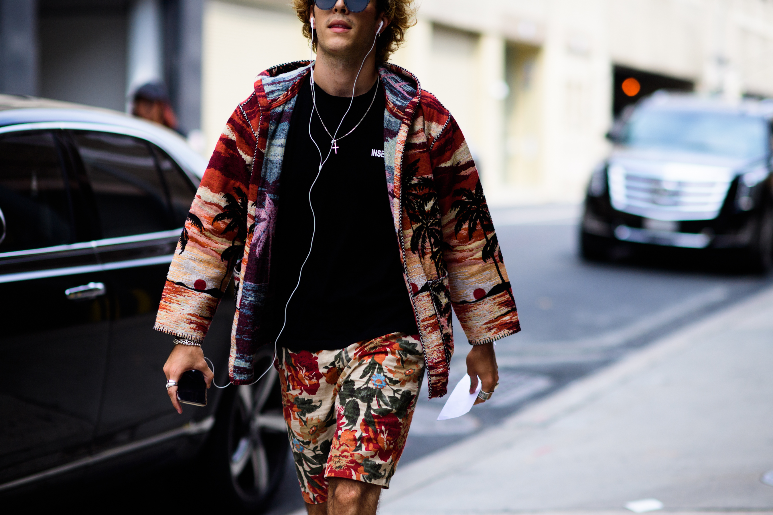 Man wearing floral print outfit